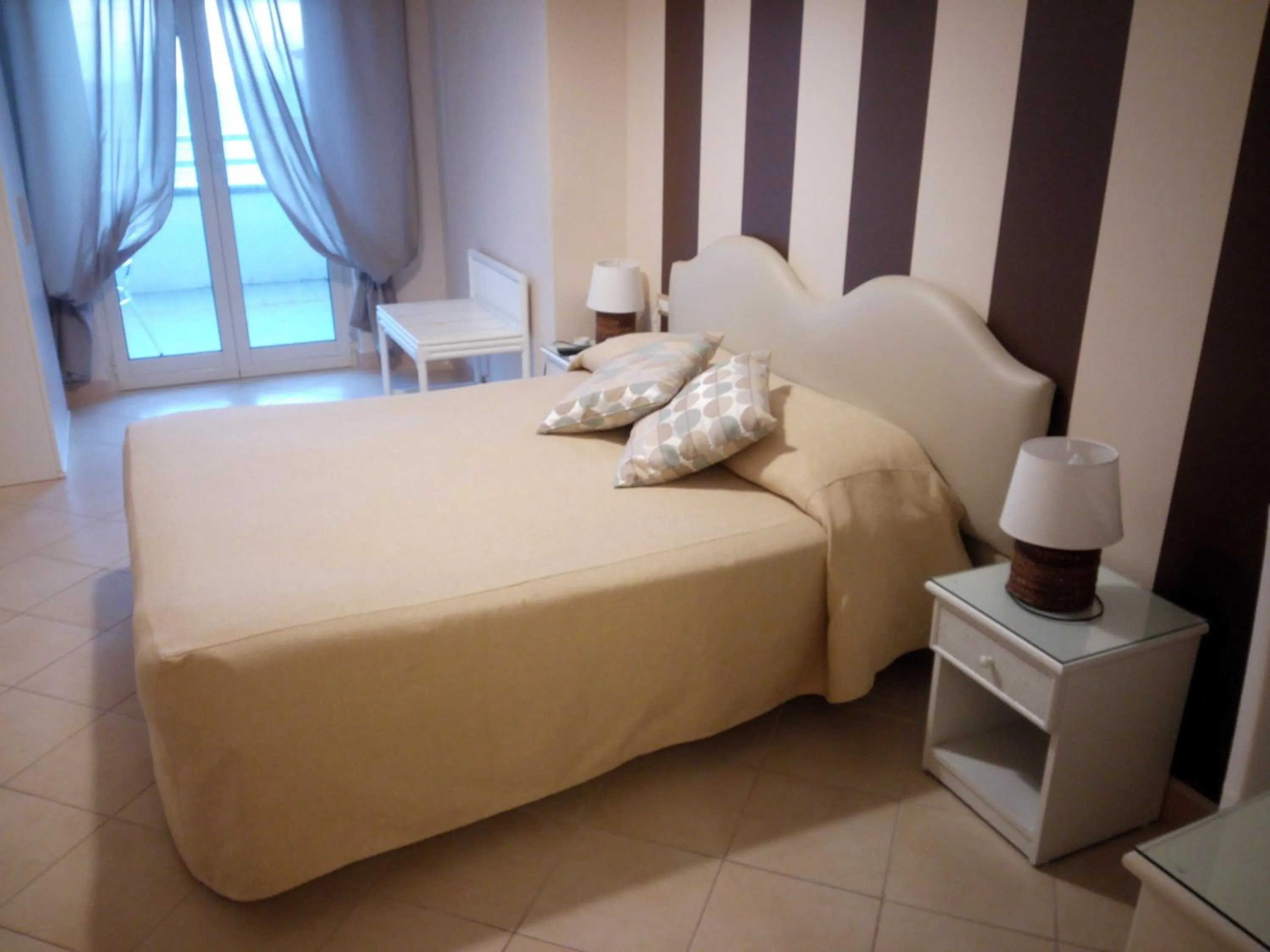 Photo of the whole room, Bed in Mini Hotel - Angolo Di Paradiso -