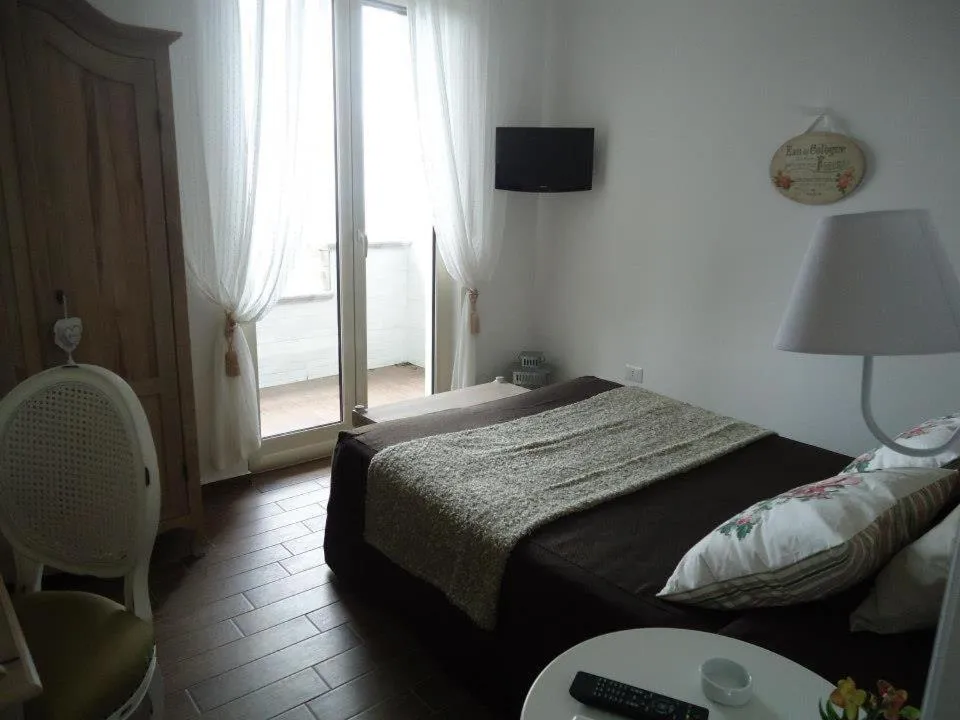 Bed in Mini Hotel - Angolo Di Paradiso -