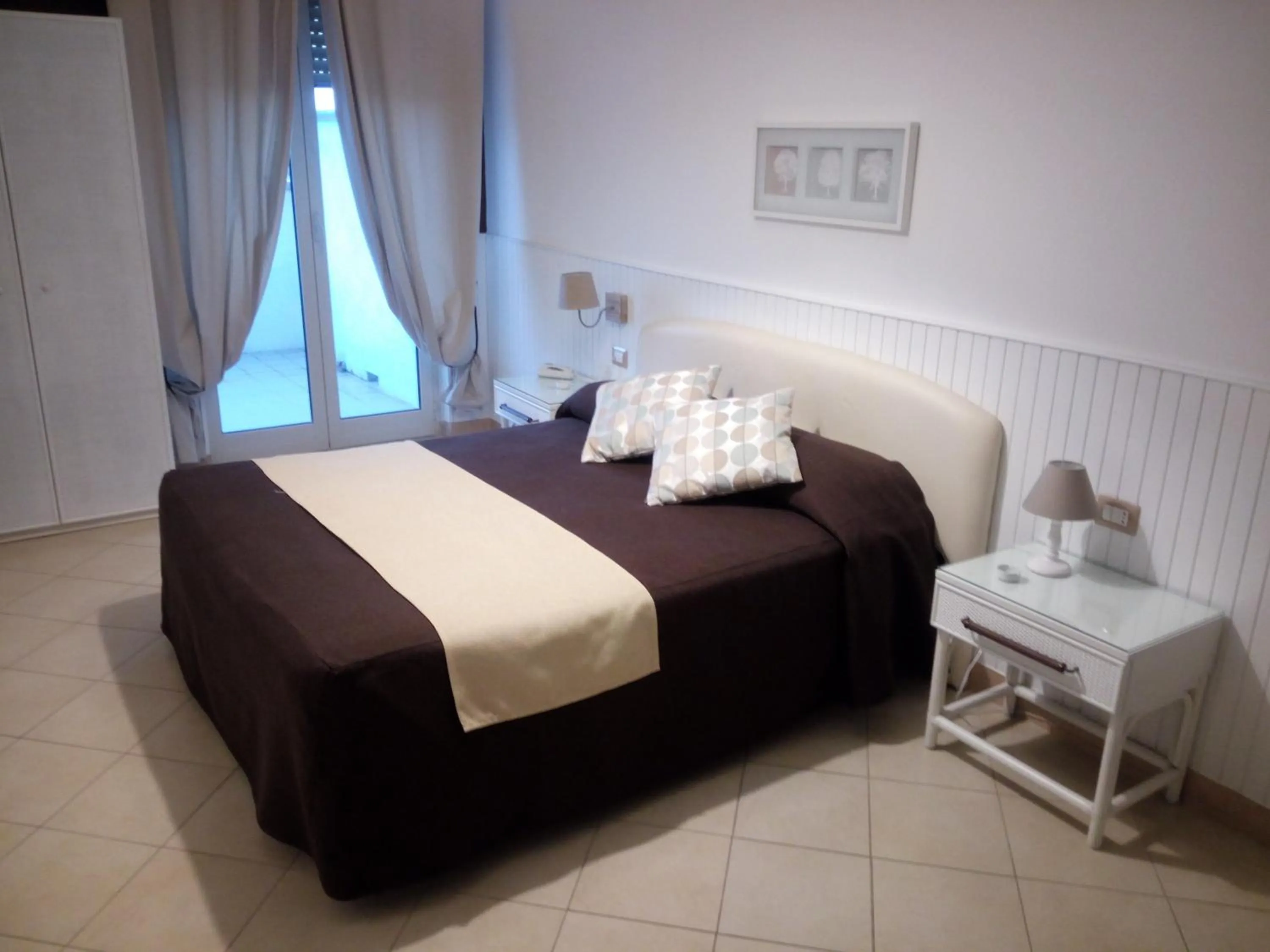 Photo of the whole room, Bed in Mini Hotel - Angolo Di Paradiso -