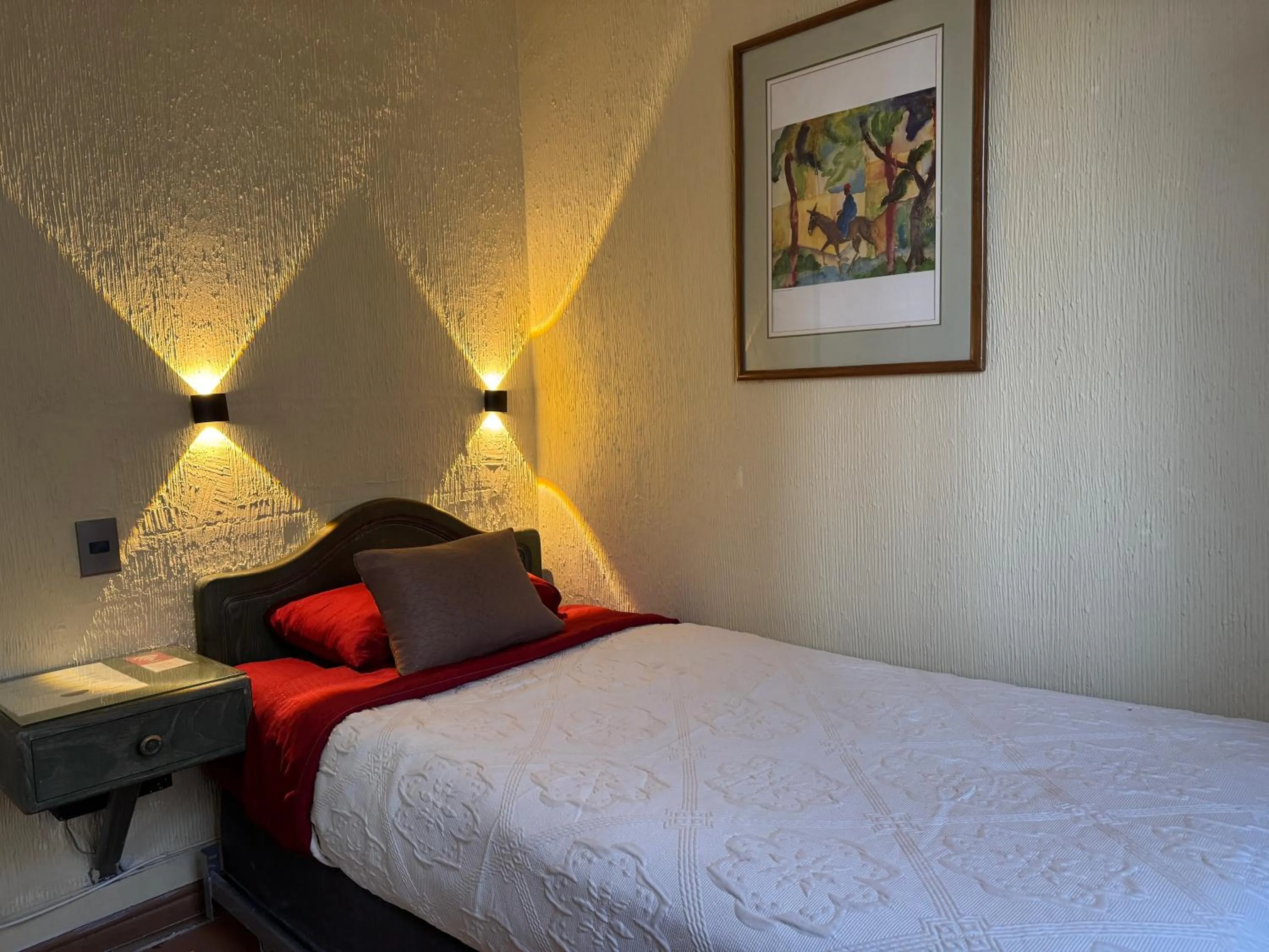 Bed in Intimo Hotel Miraflores