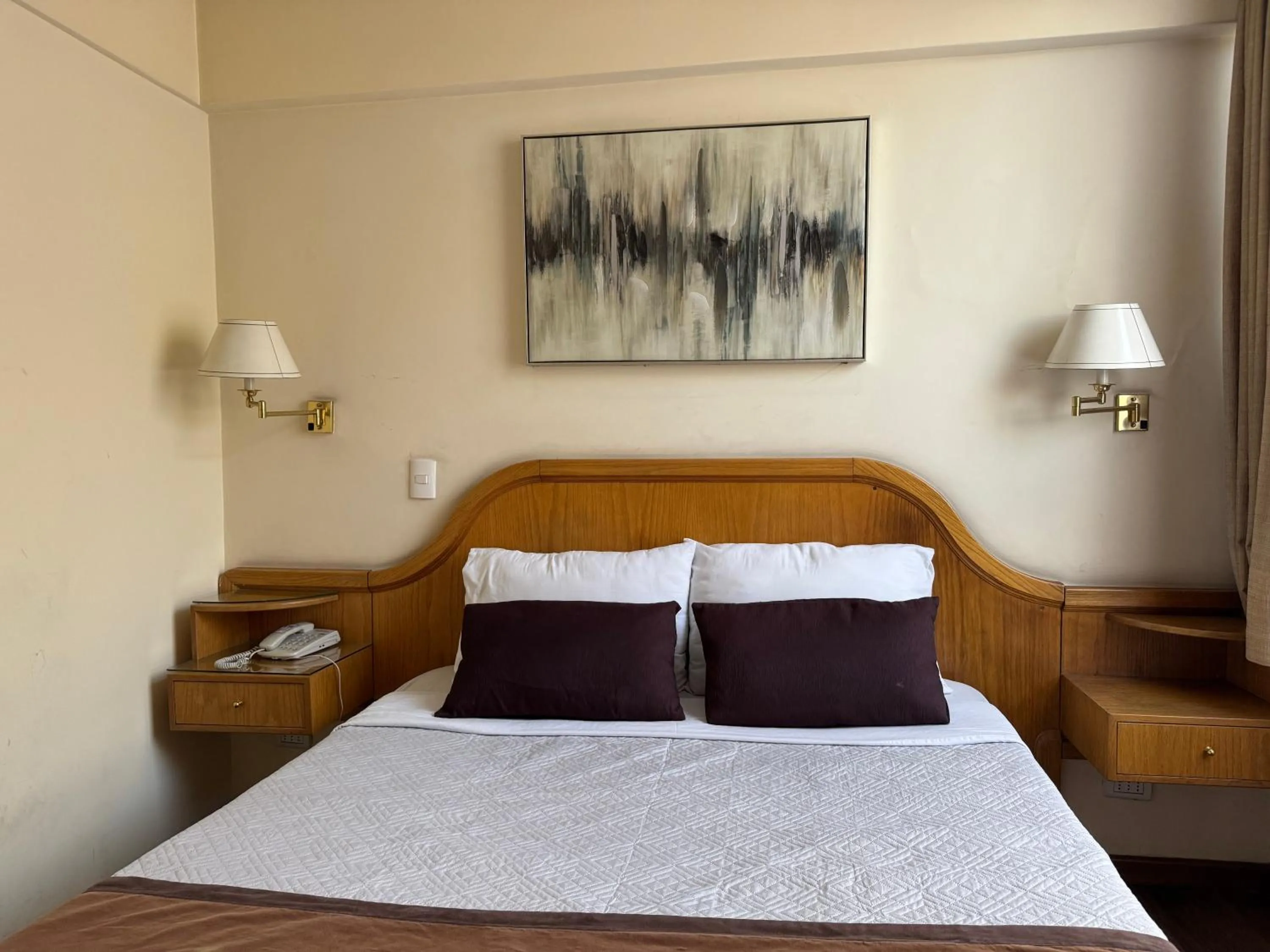 Bed in Intimo Hotel Miraflores