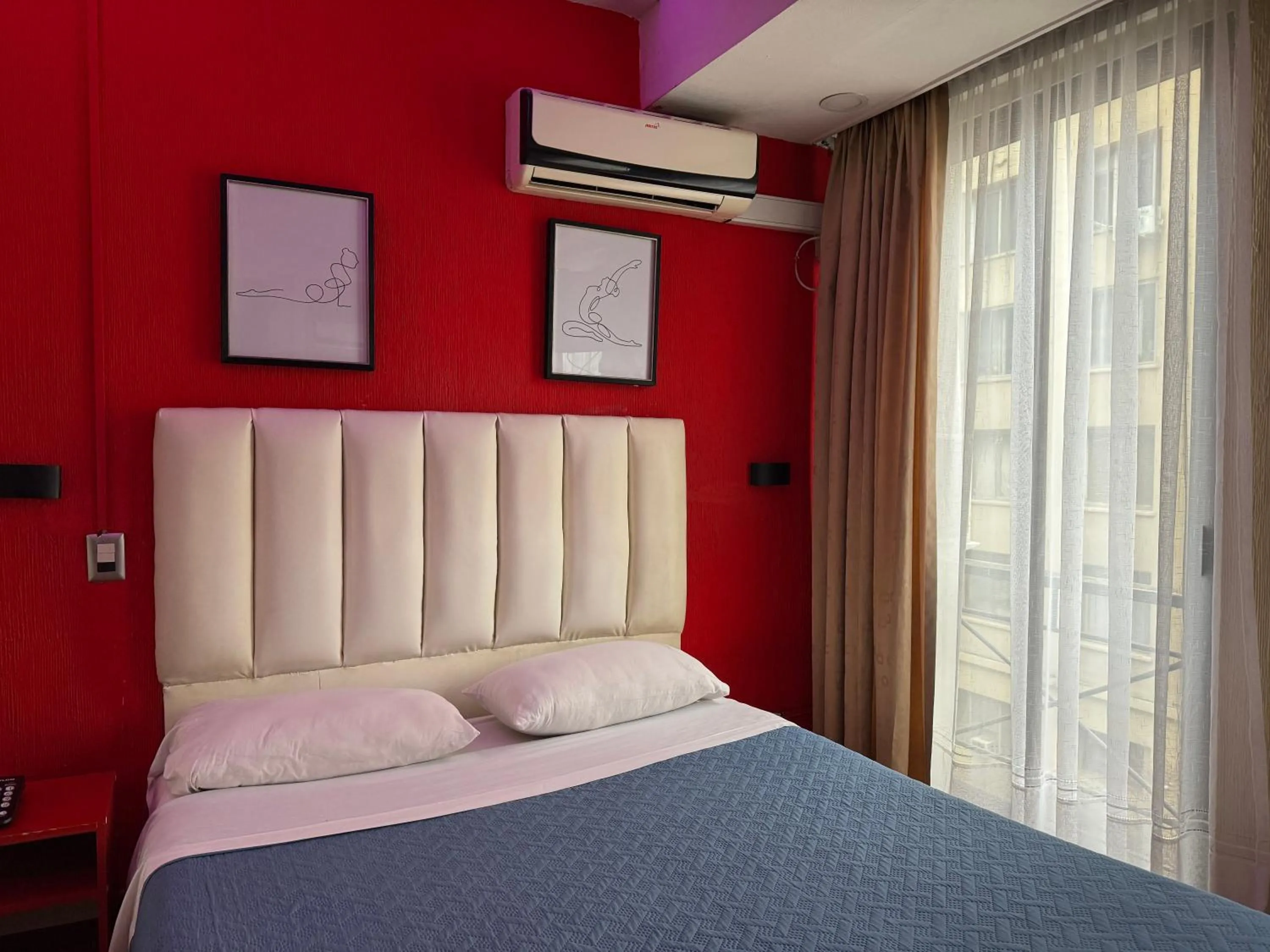 Bed in Intimo Hotel Miraflores