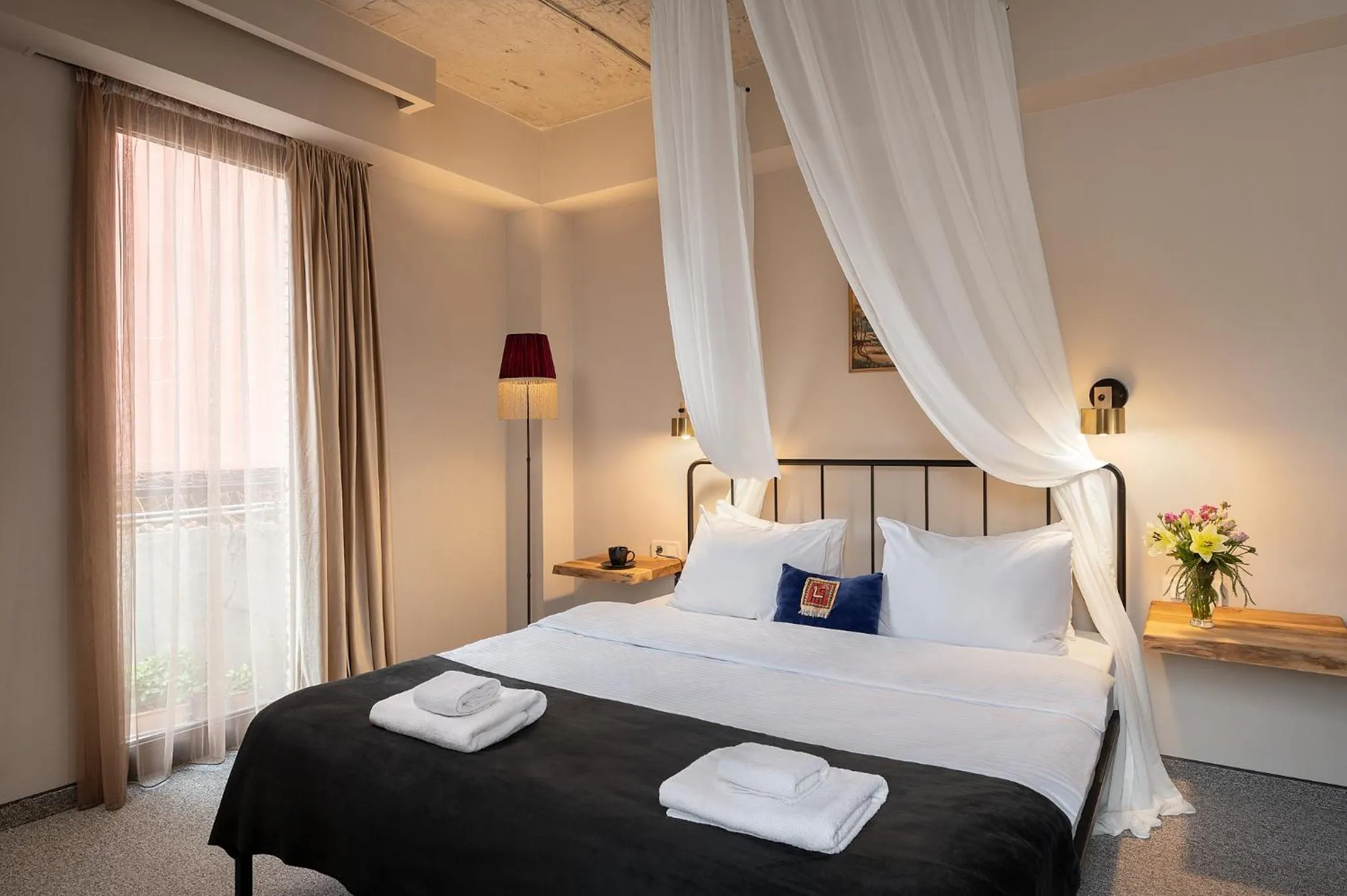 Photo of the whole room, Bed in Galavani By Vintage Hotel Collections