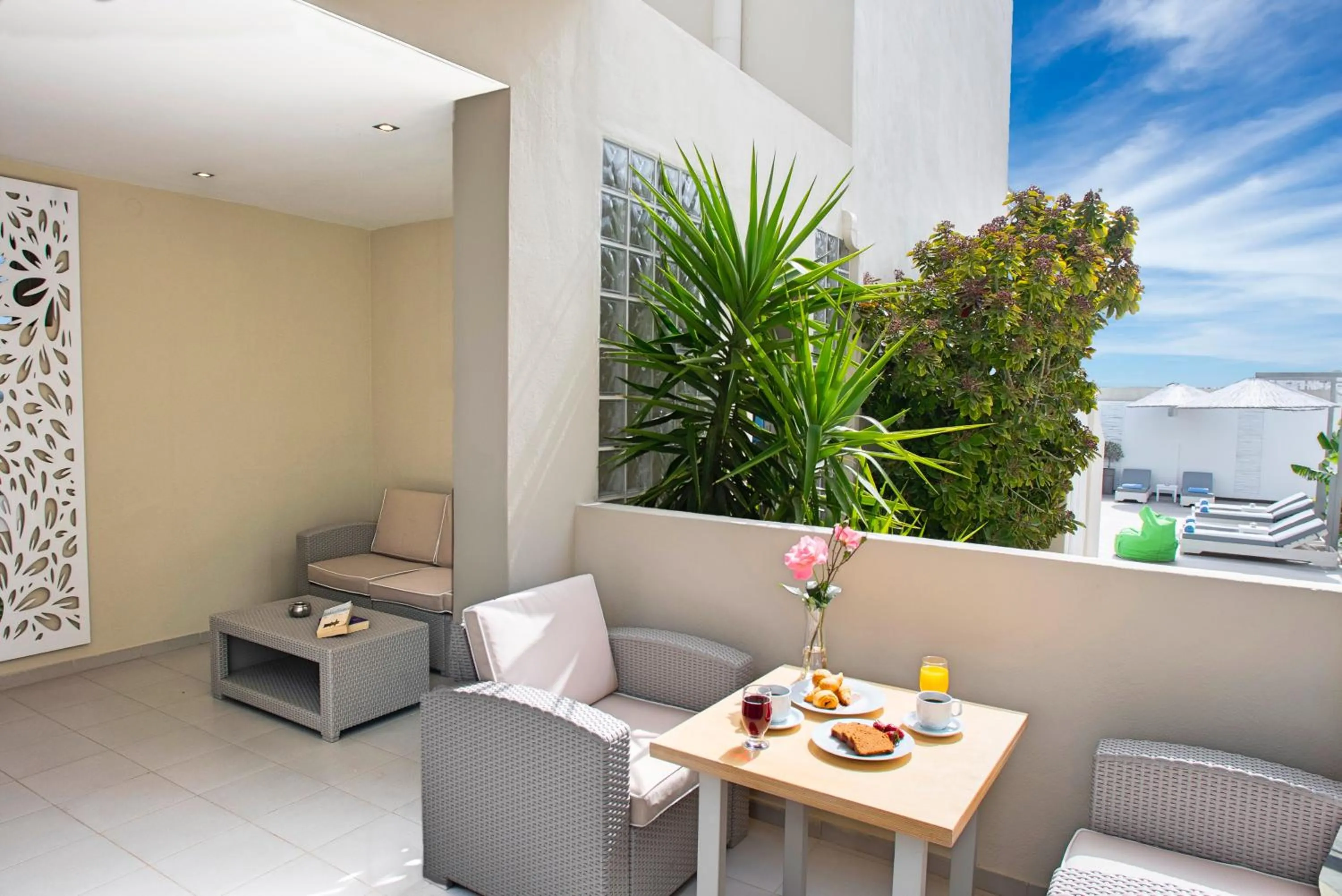 Patio in Elounda Garden Suites Heated Pool