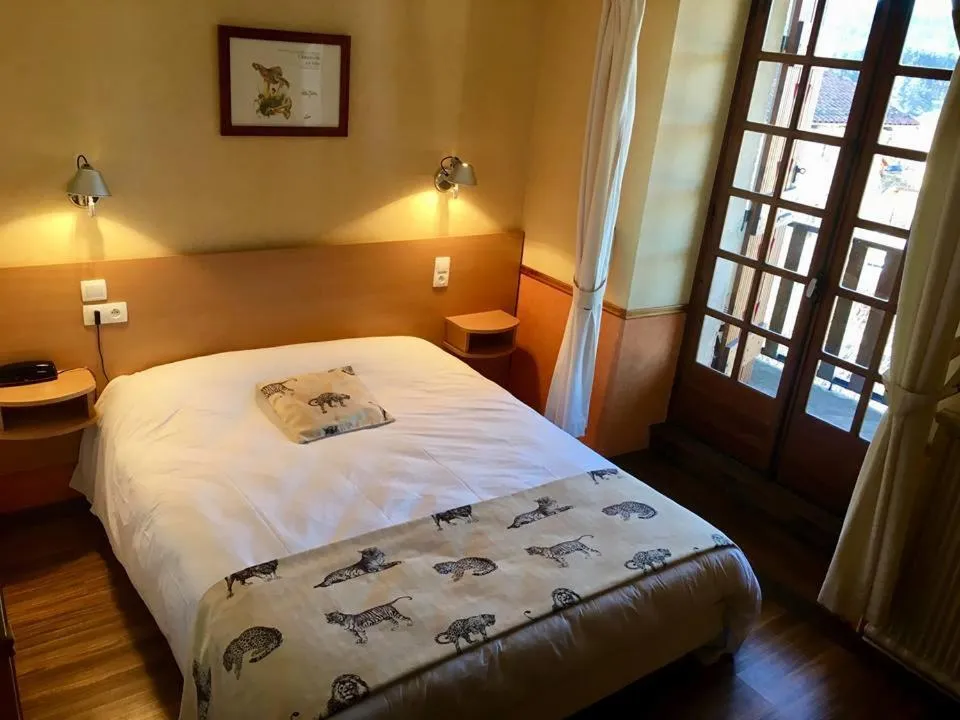 Bed in Hôtel La Clairière