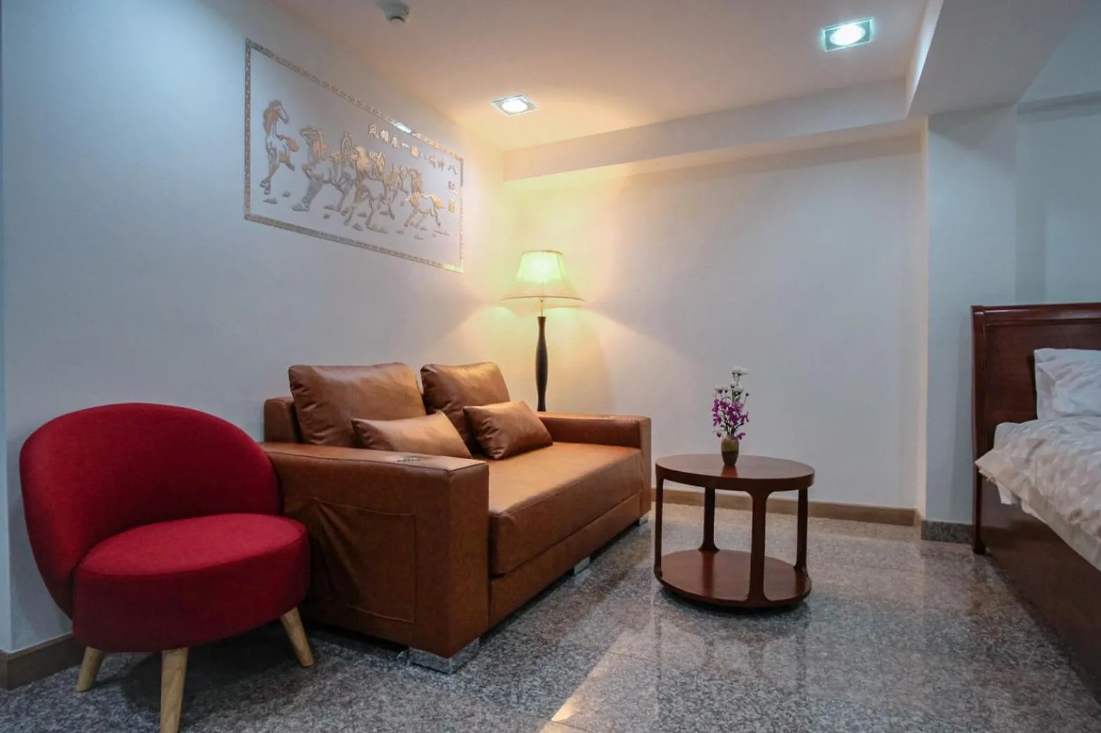 Seating area, Bed in Cha Li's Family Hotel&Hostel