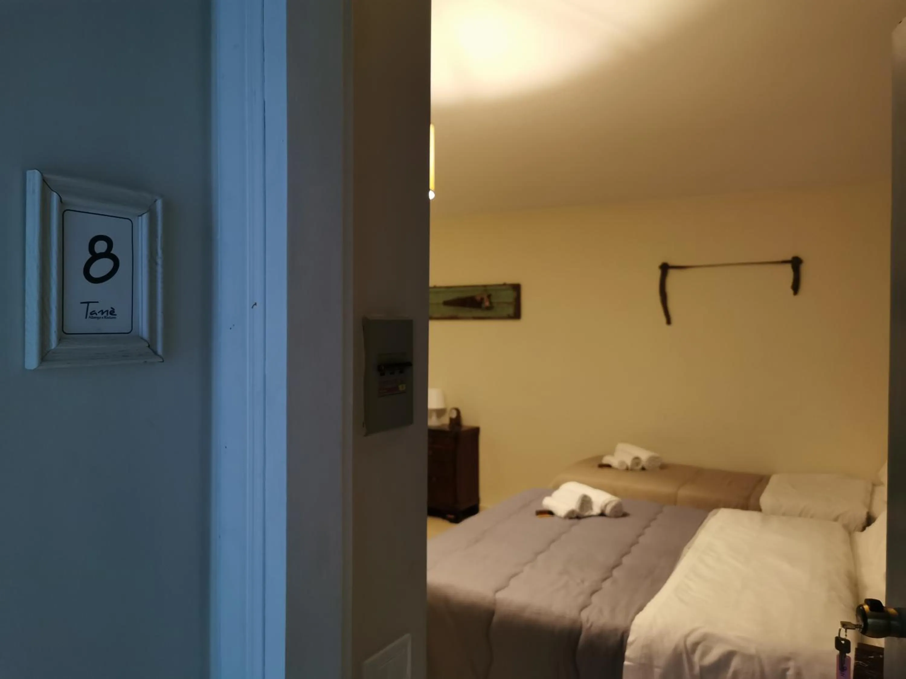 Photo of the whole room, Bed in Locanda Tanè