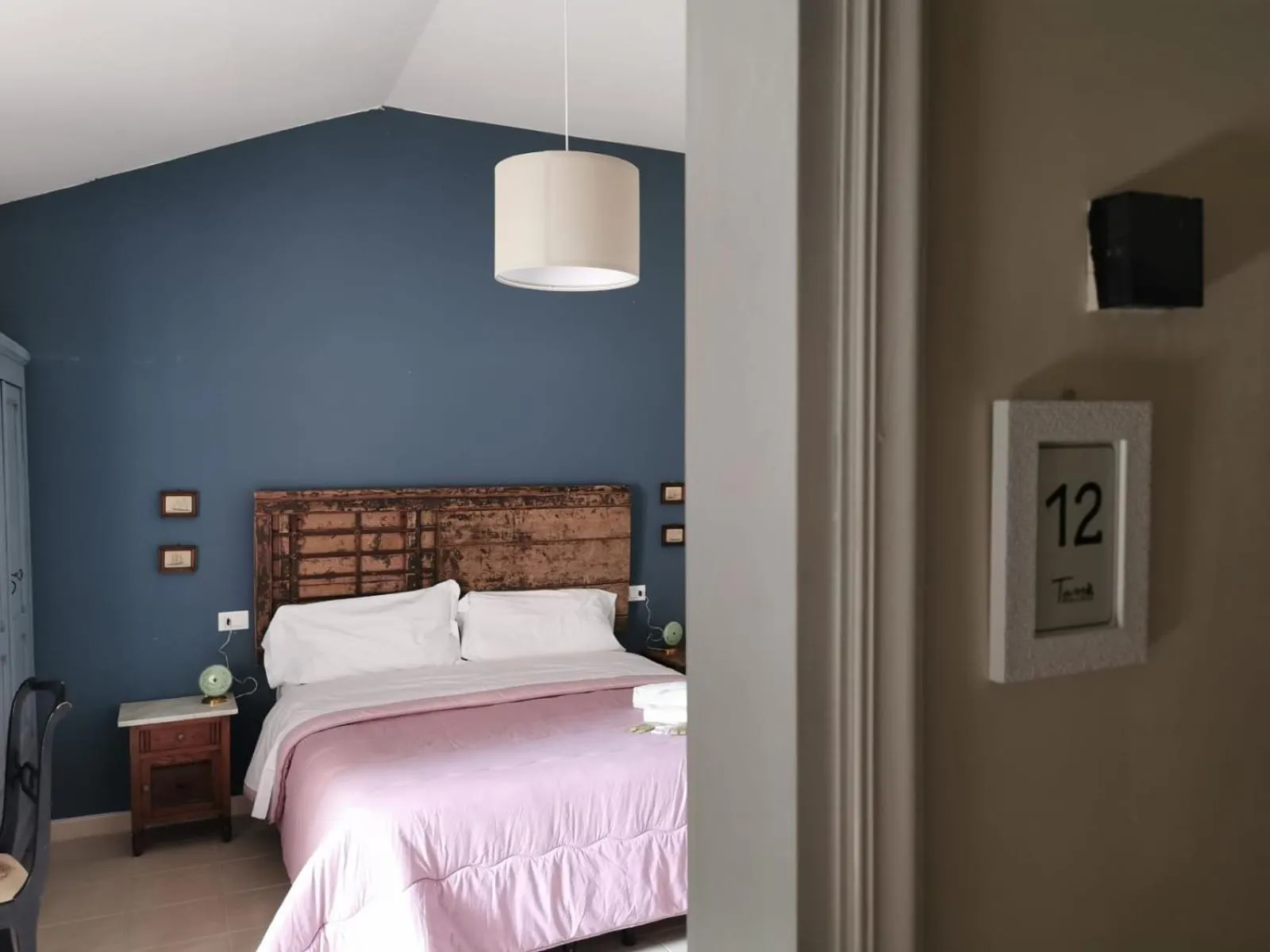 Photo of the whole room, Bed in Locanda Tanè