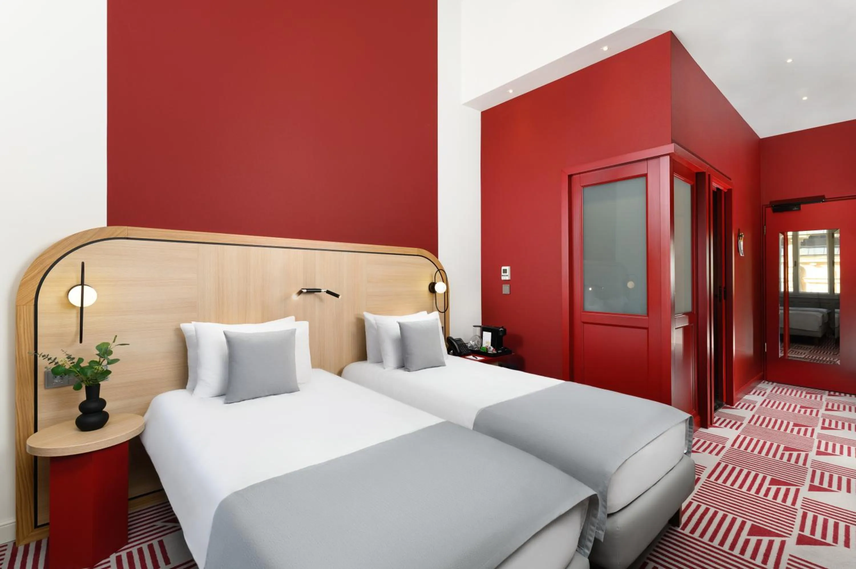 Photo of the whole room, Bed in Hotel Oktogon Haggenmacher by Continental Group