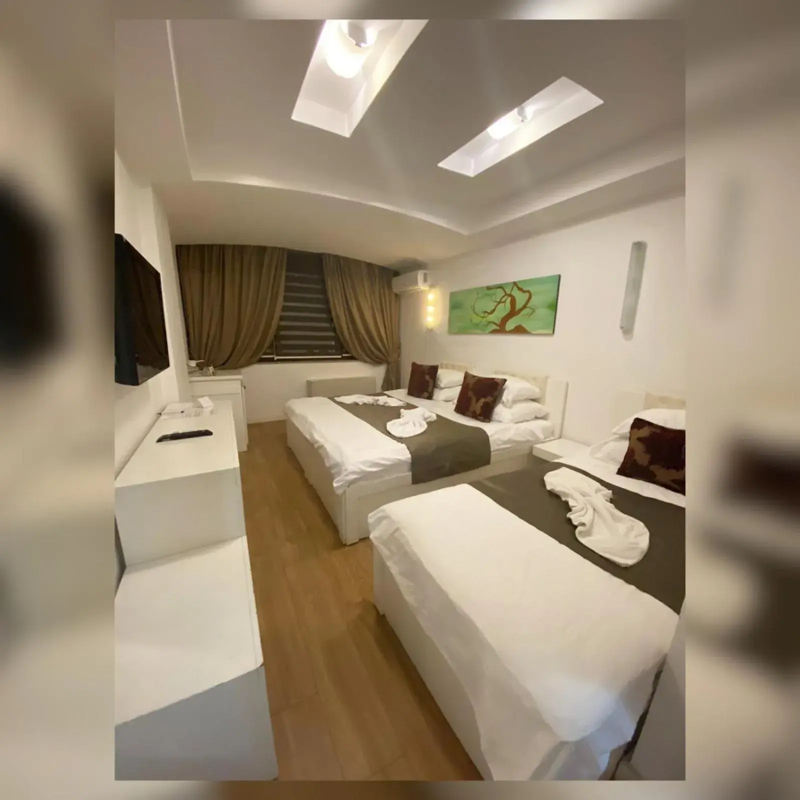 Triple Room in Theranda Hotel Triple Room in Theranda Hotel