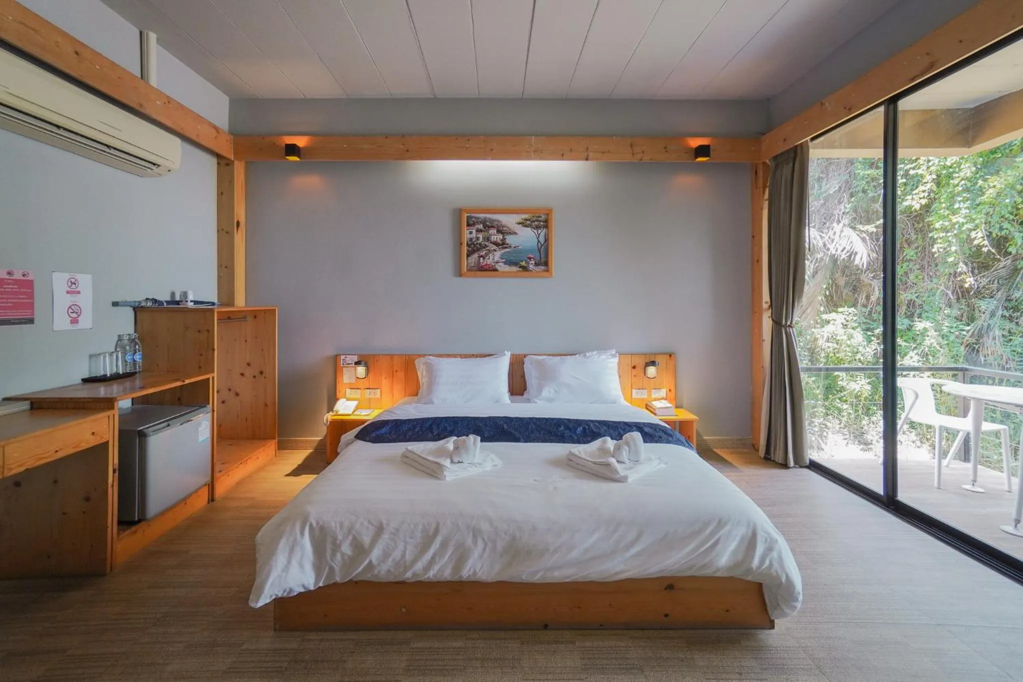 Bed in The Grace Amphawa