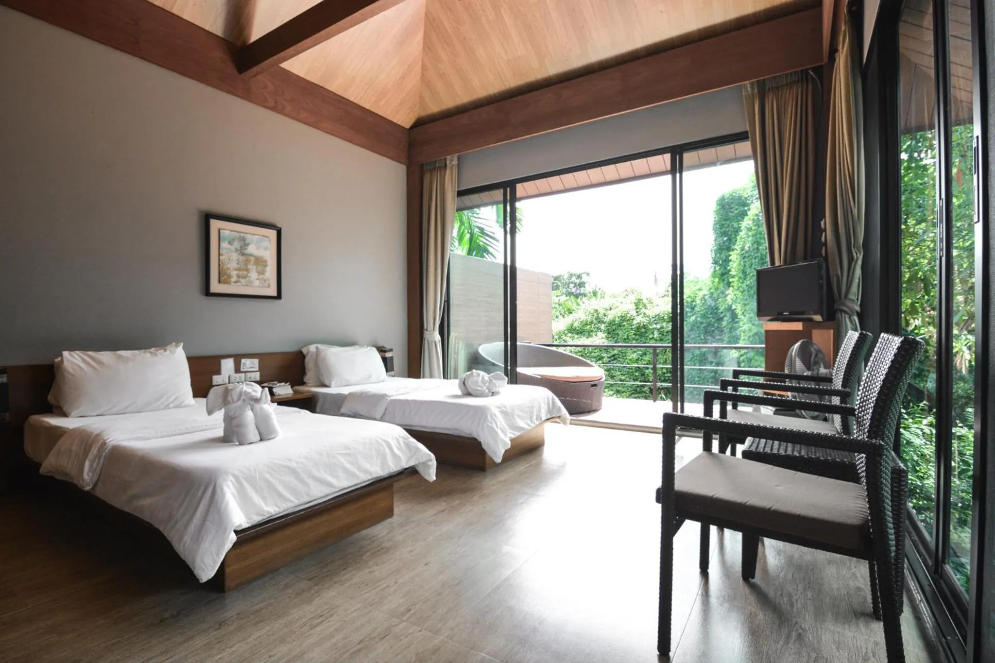 Photo of the whole room, Bed in The Grace Amphawa