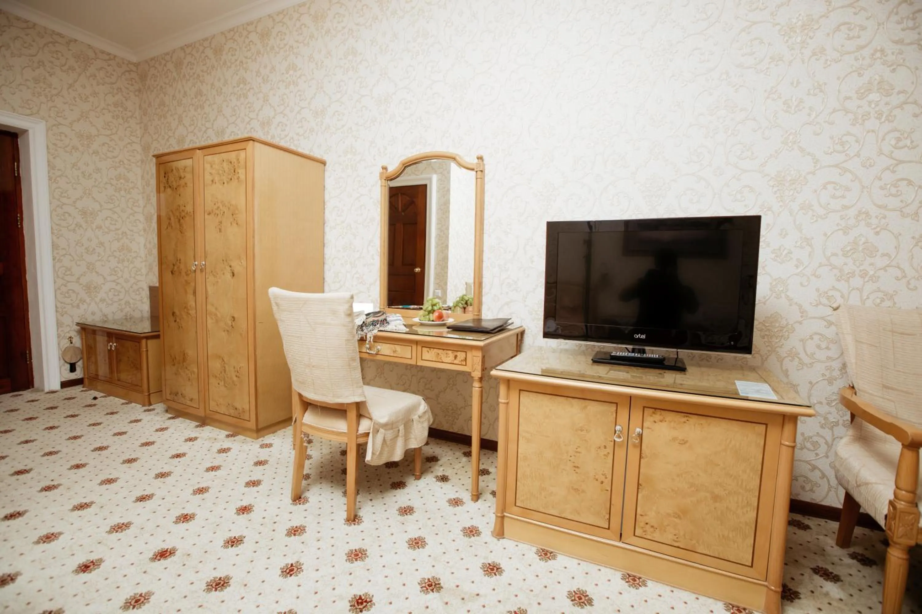 Communal lounge/ TV room in Hotel Asia Khiva