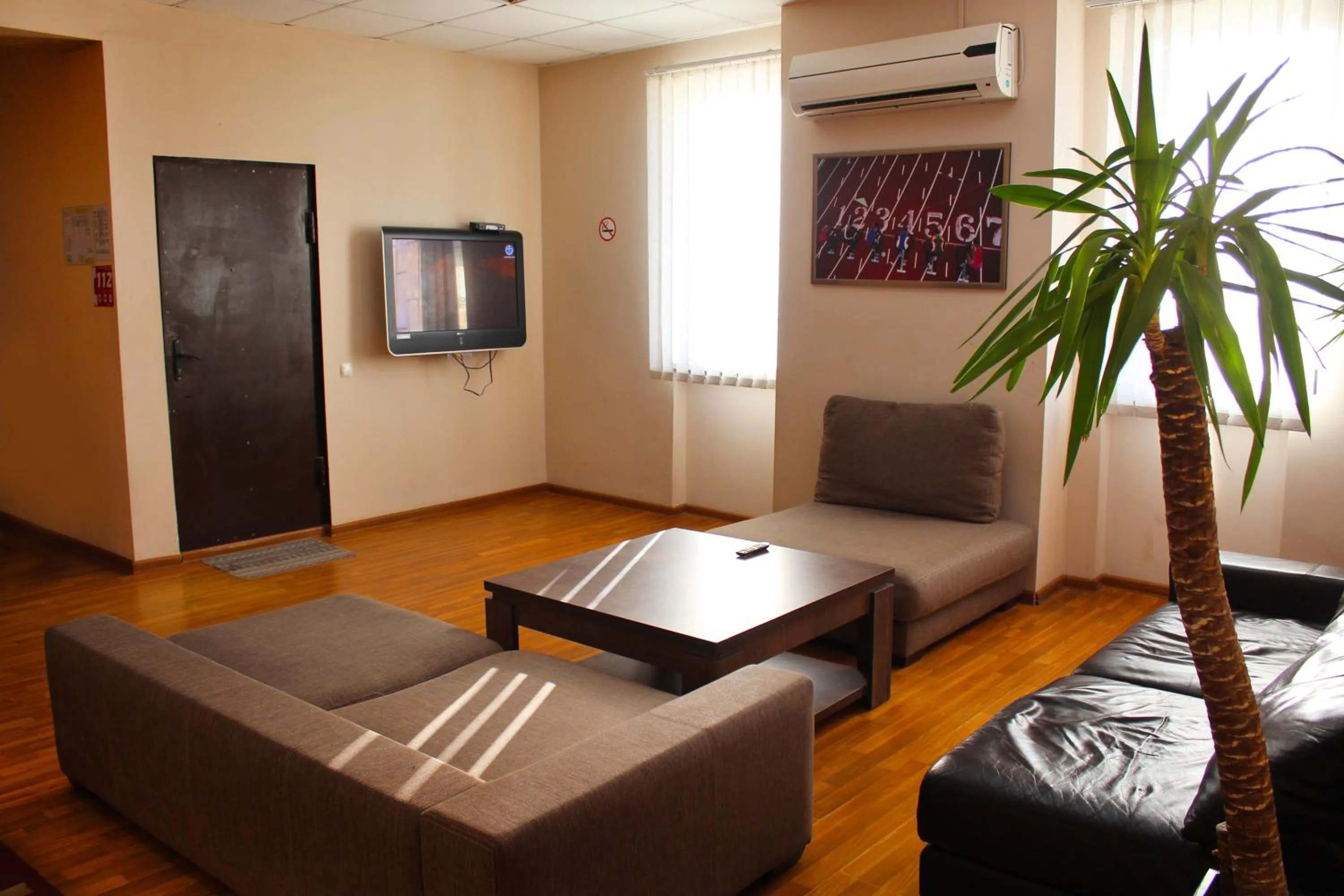 TV and multimedia, Seating Area in Athletics Hotel