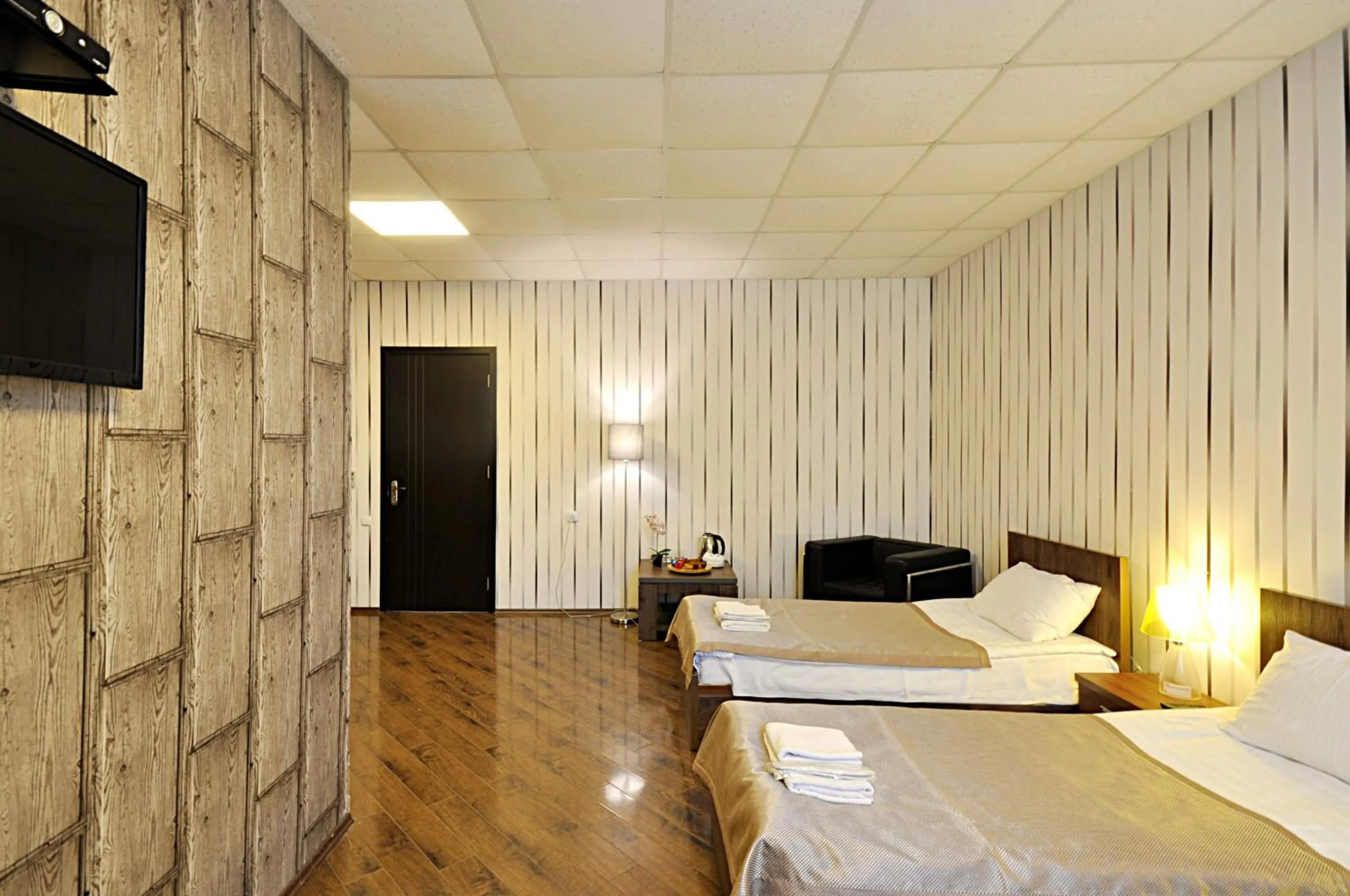 TV and multimedia, TV/Entertainment Center in Athletics Hotel