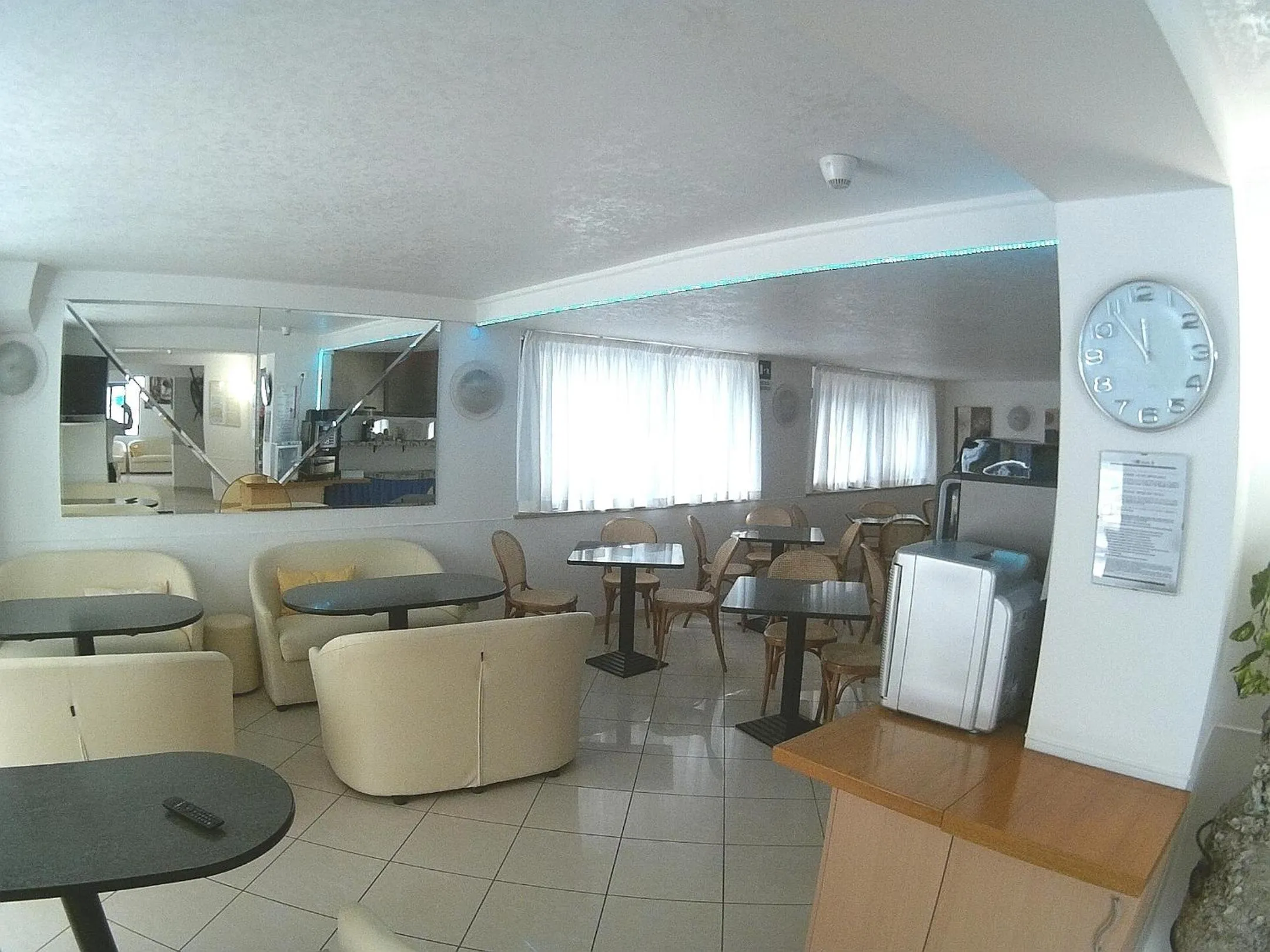 Communal lounge/ TV room in Hotel Azzurro