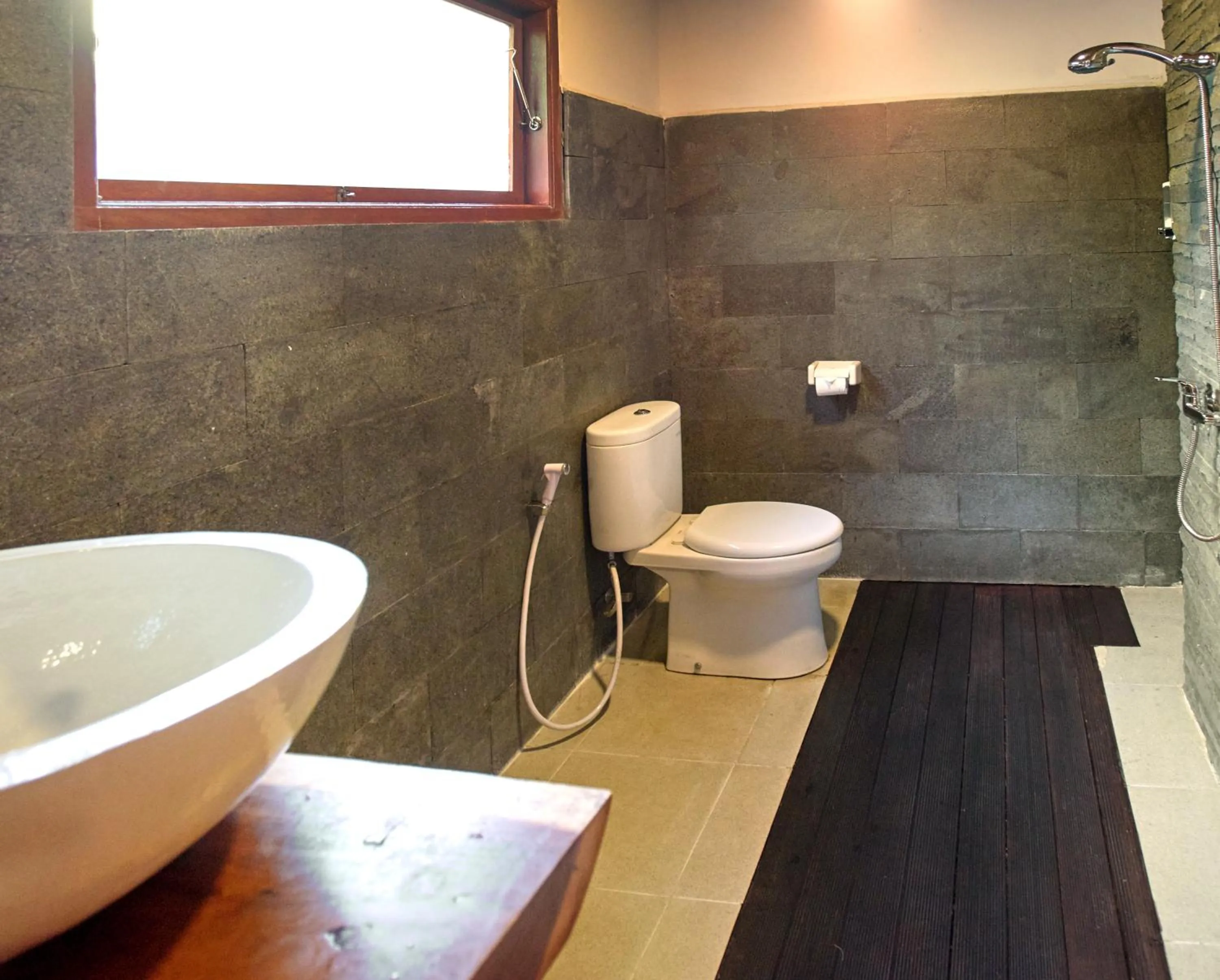 Toilet in Tattva Ubud Retreat & Wellness