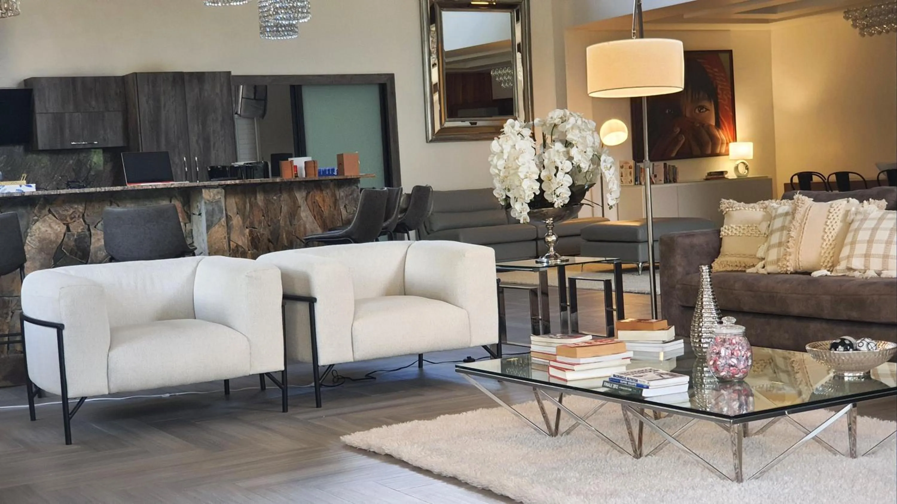 Communal lounge/ TV room in The Residence by Villa Alejandro