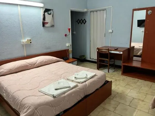 Triple Room in Albergo Fiorita Triple Room in Albergo Fiorita