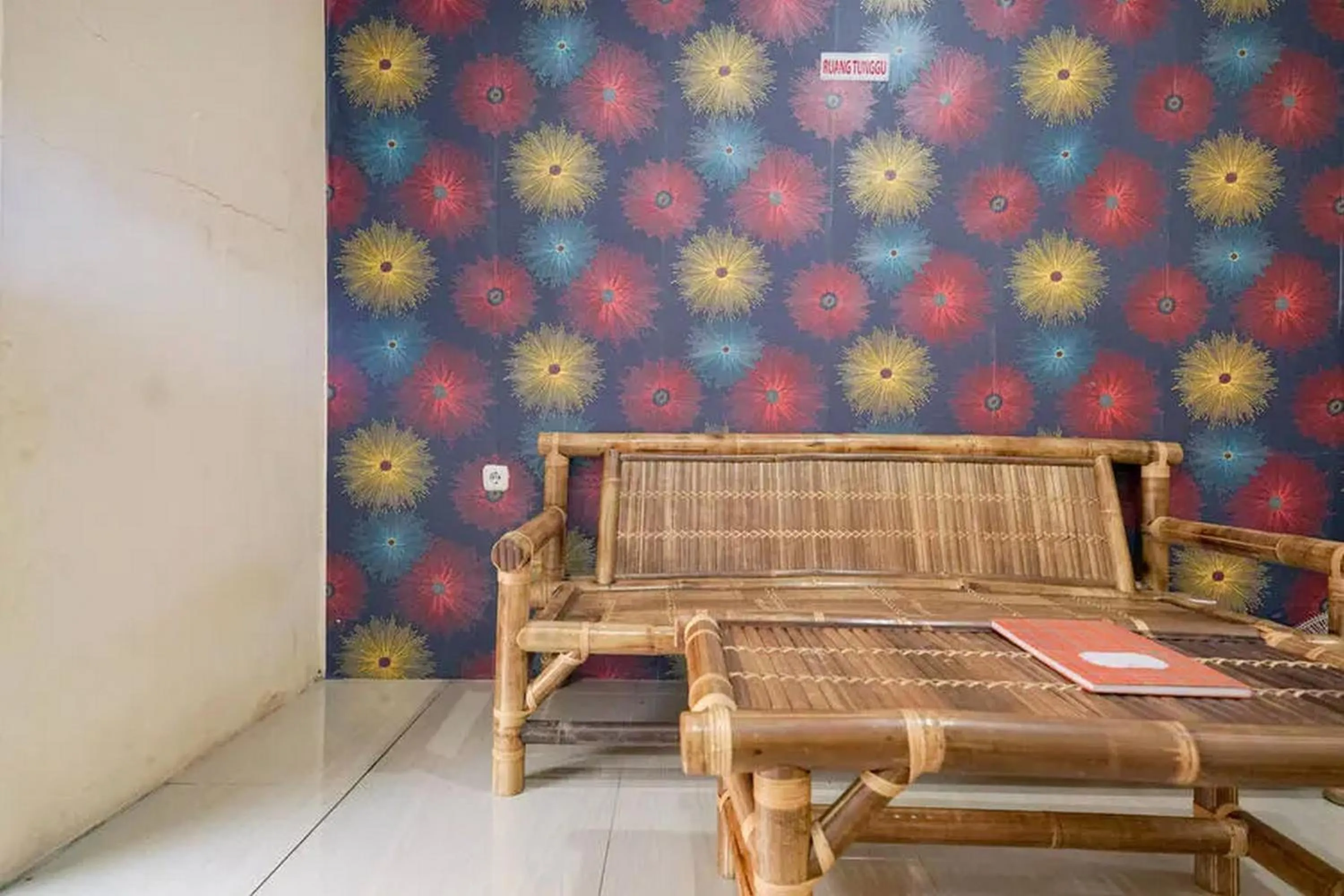 Seating area in RedDoorz near Ekowisata Mangrove Belawan Medan