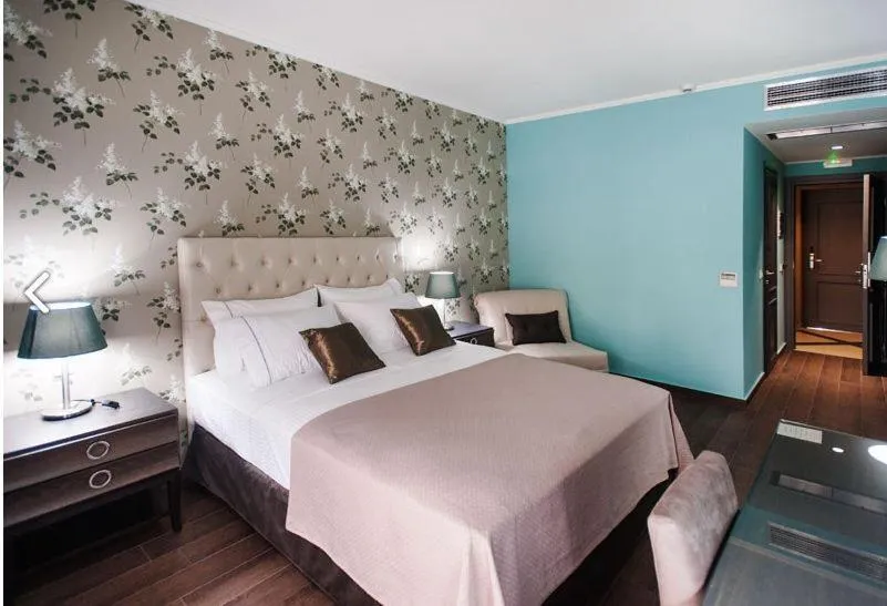 Bed in Theasis Hotel Paramythia