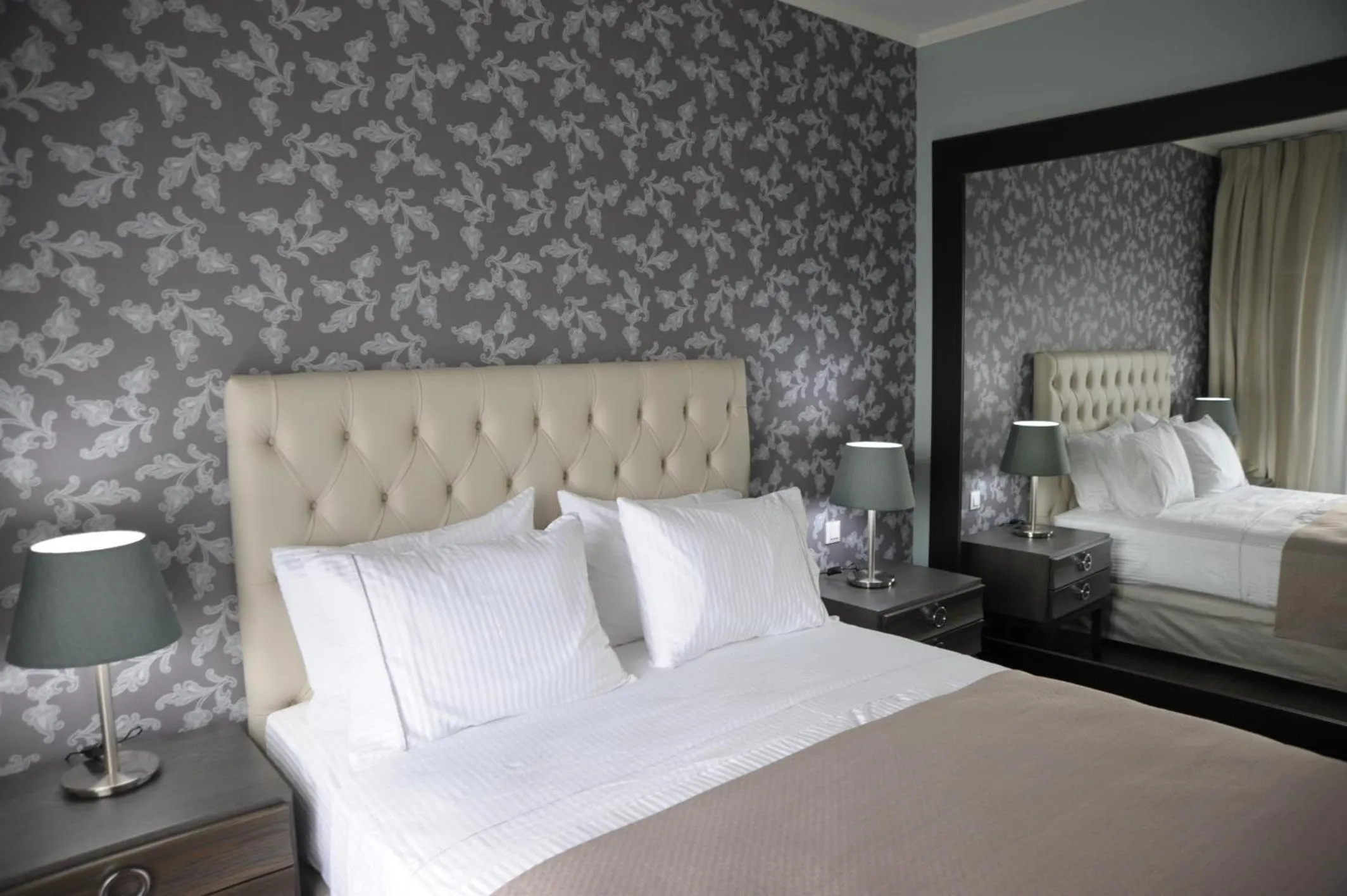 Bed in Theasis Hotel Paramythia