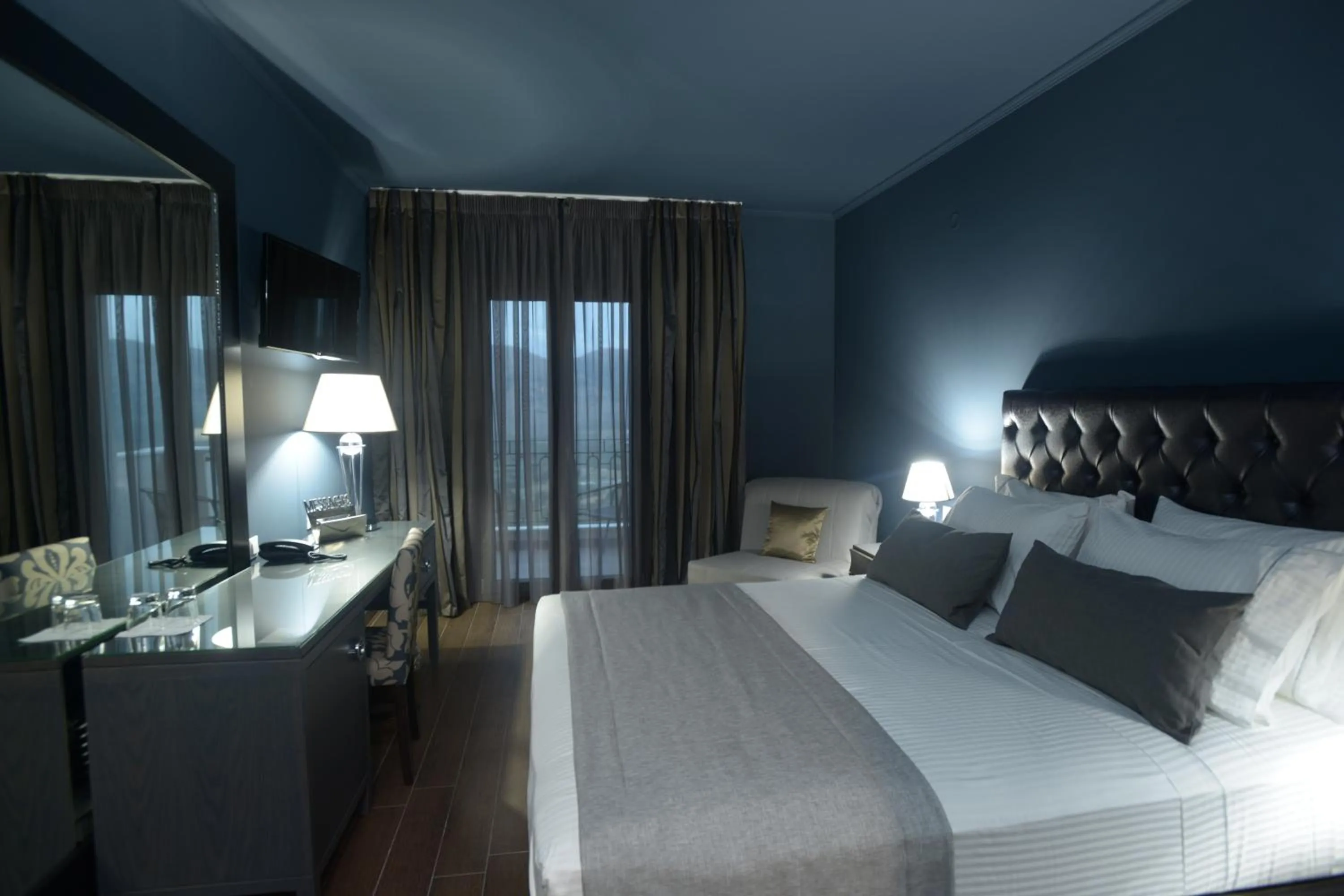 Bed in Theasis Hotel Paramythia