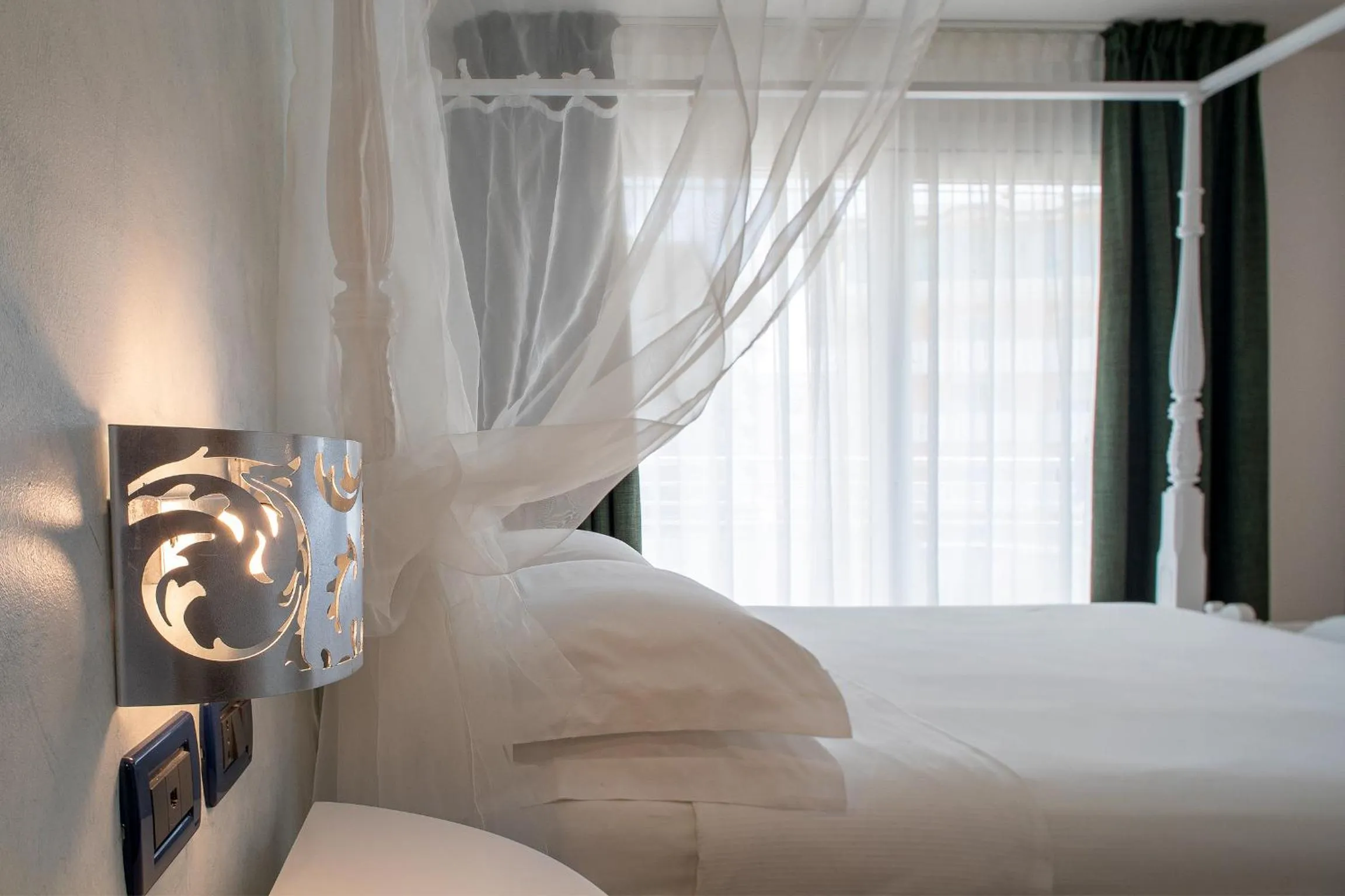 Bed in Fantinello Hotel