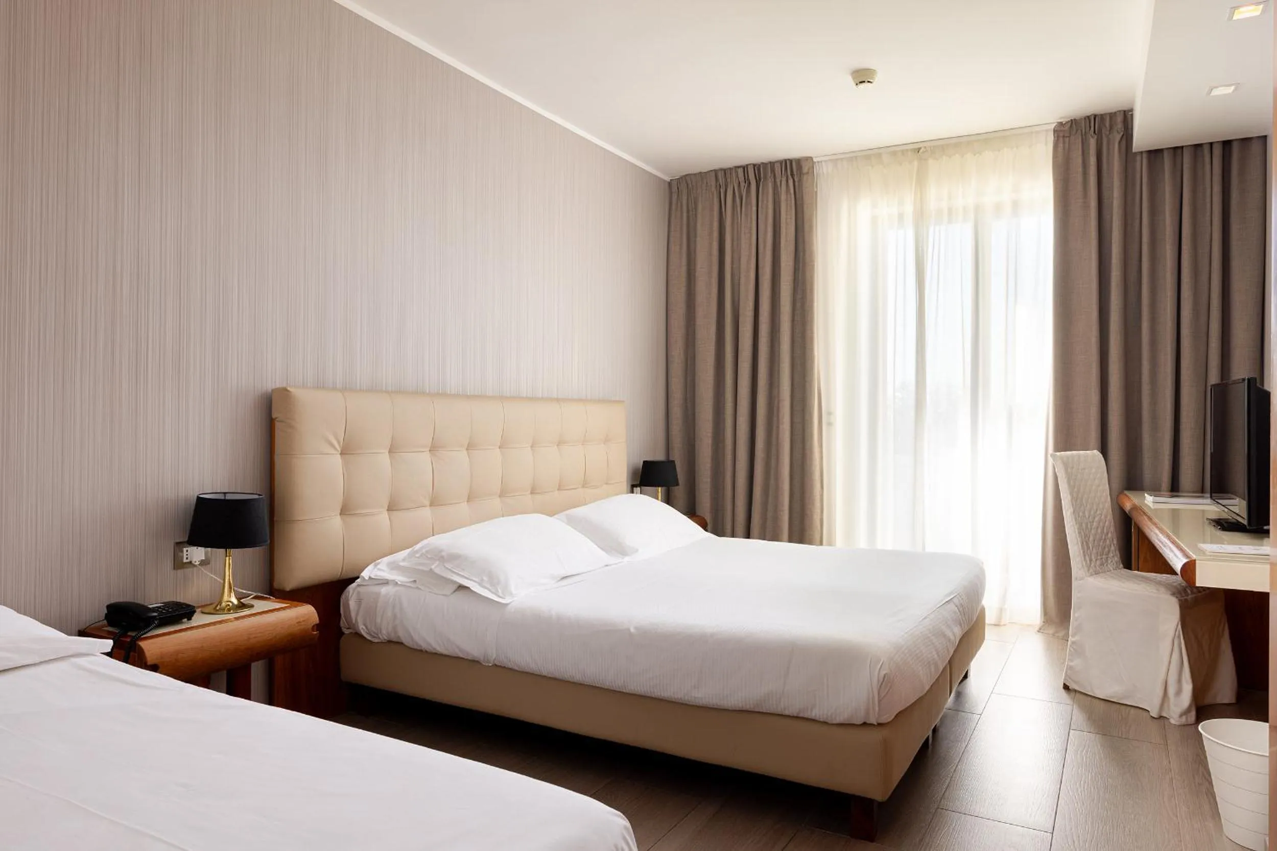 Bed in D'Aragona Lifestyle Hotel