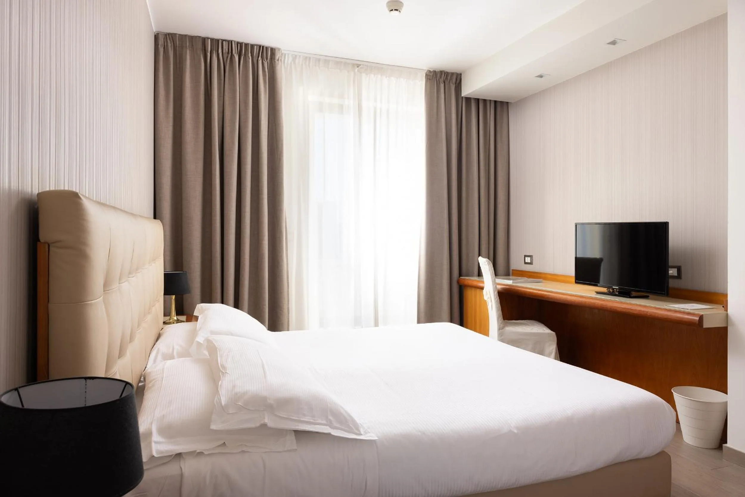 Bed in D'Aragona Lifestyle Hotel