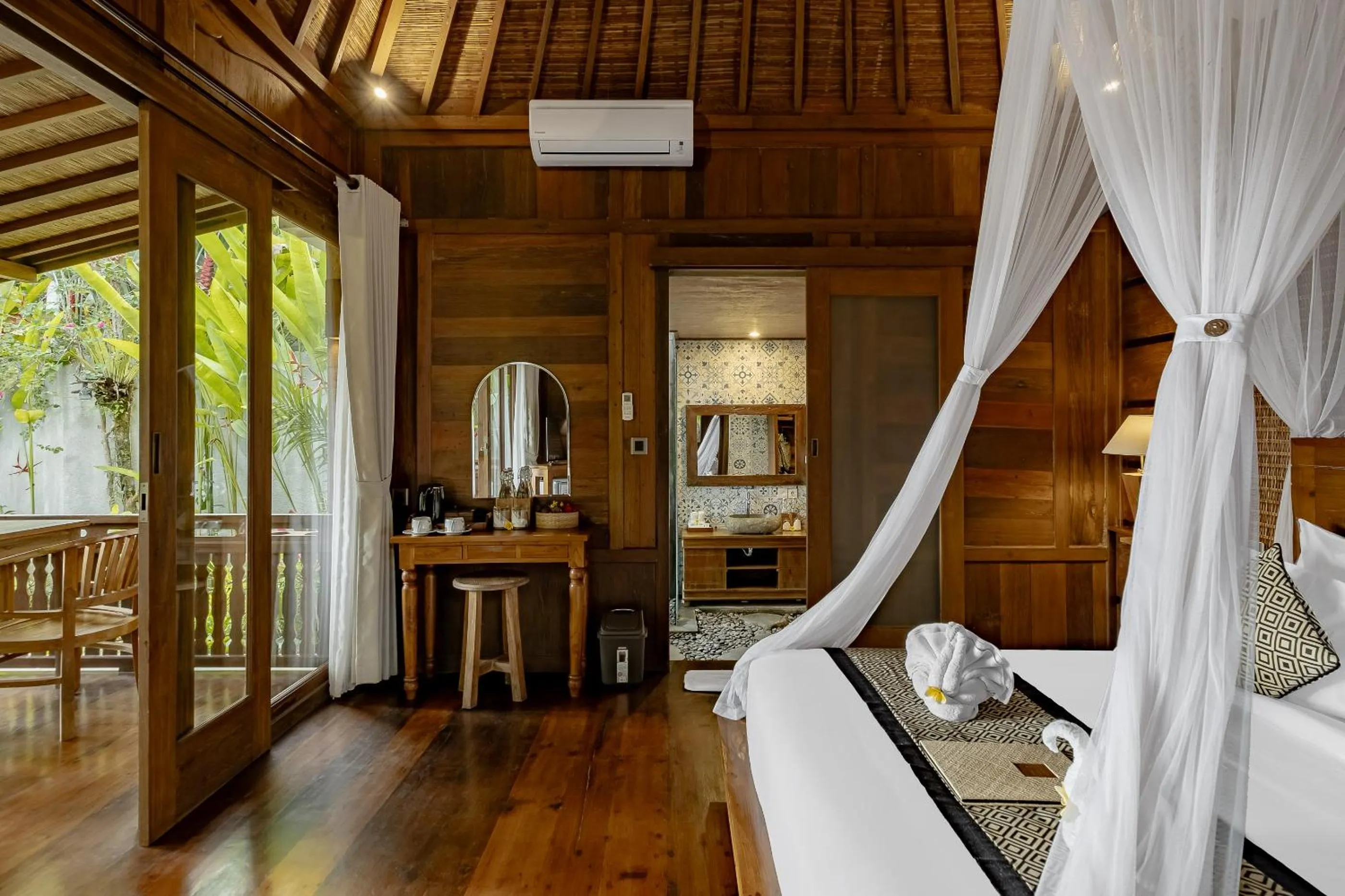 Bed in Anandari Ubud Villa