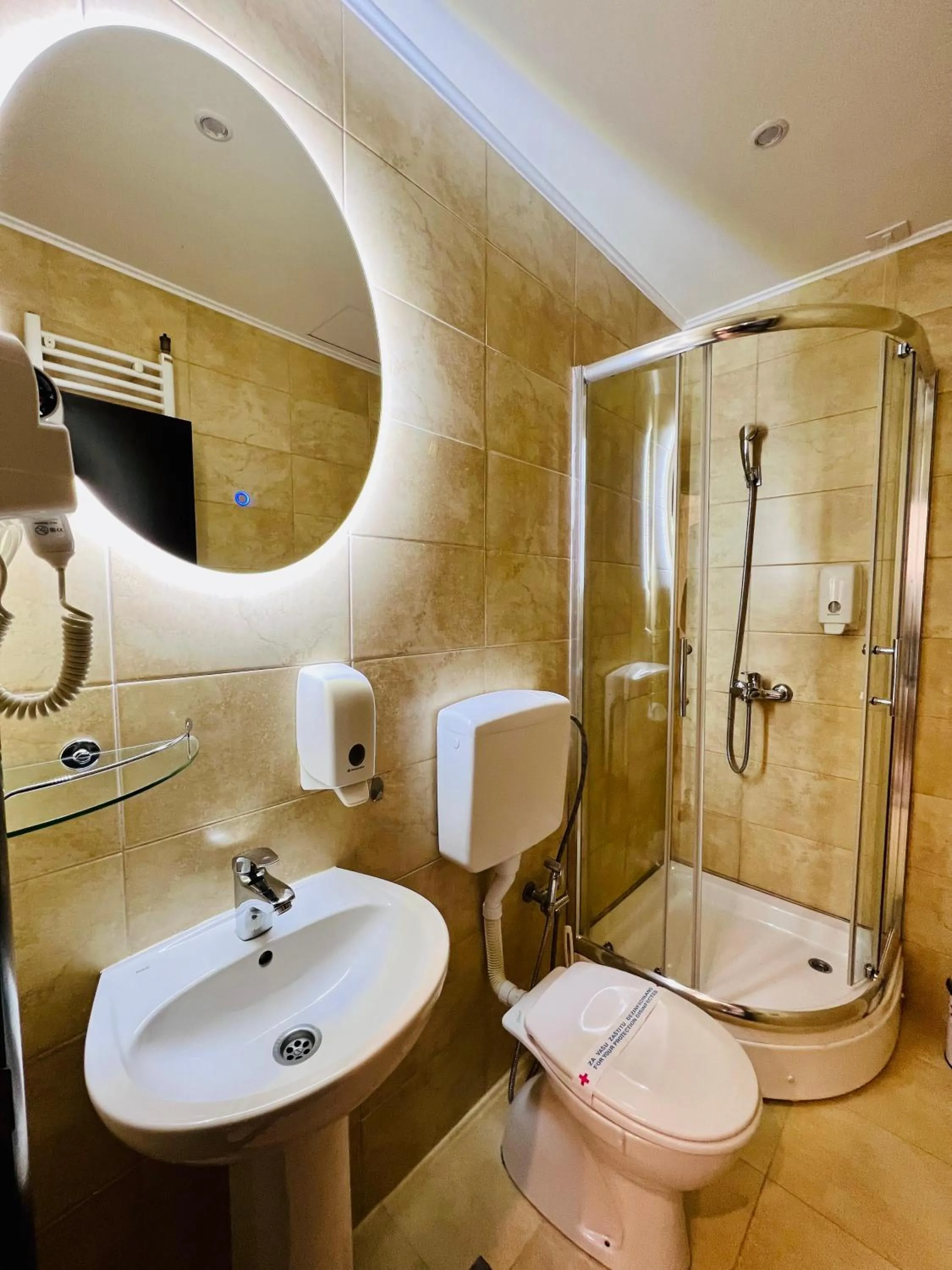 Toilet in Side One Design Hotel Garni