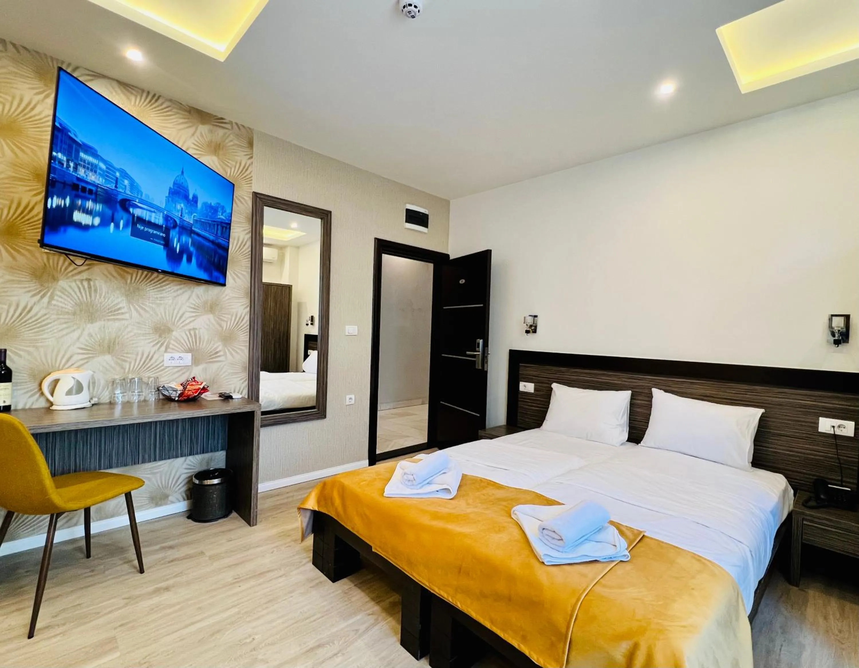 Bed in Side One Design Hotel Garni