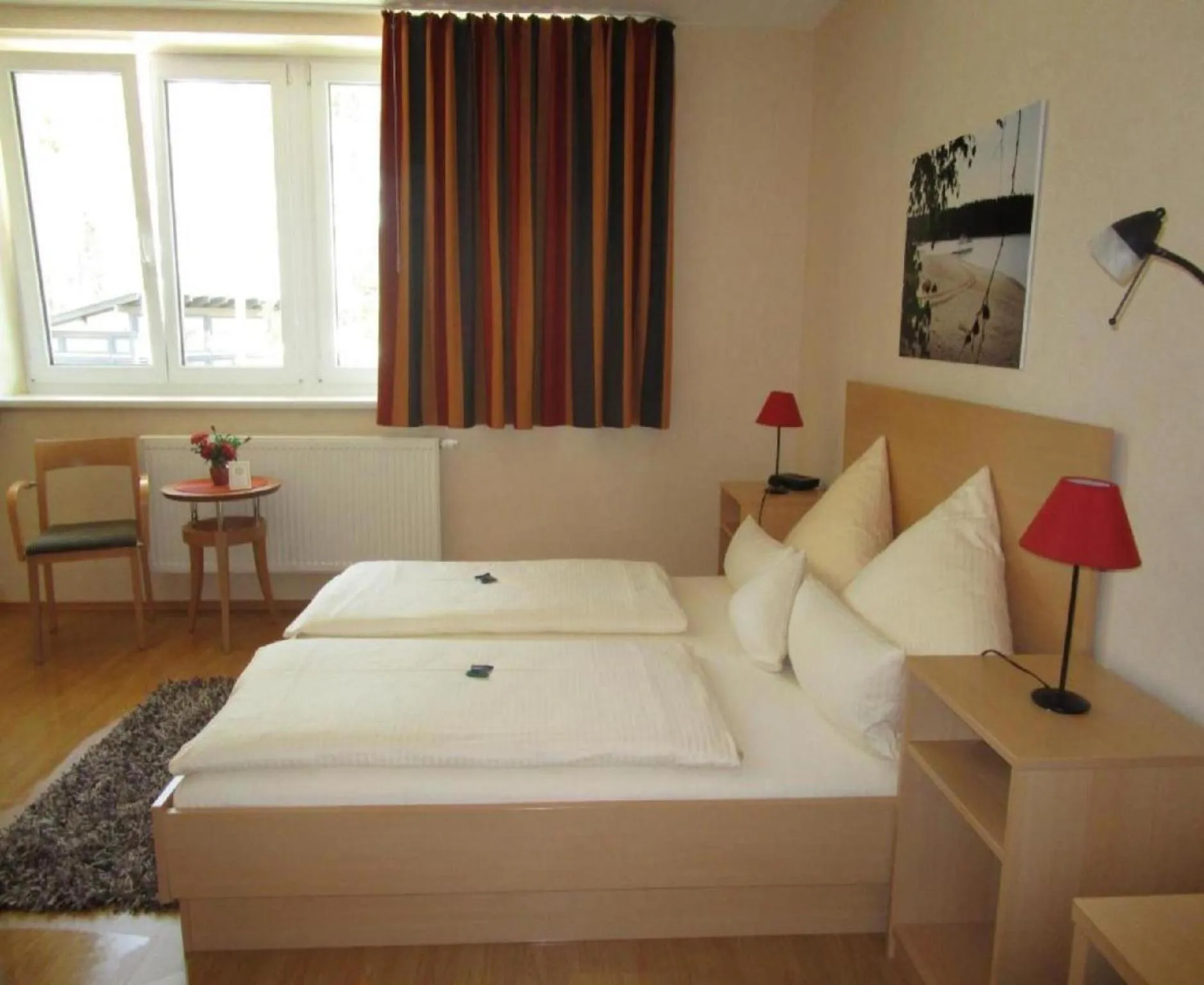 Bedroom, Bed in Bernsteinsee Hotel&Ferien