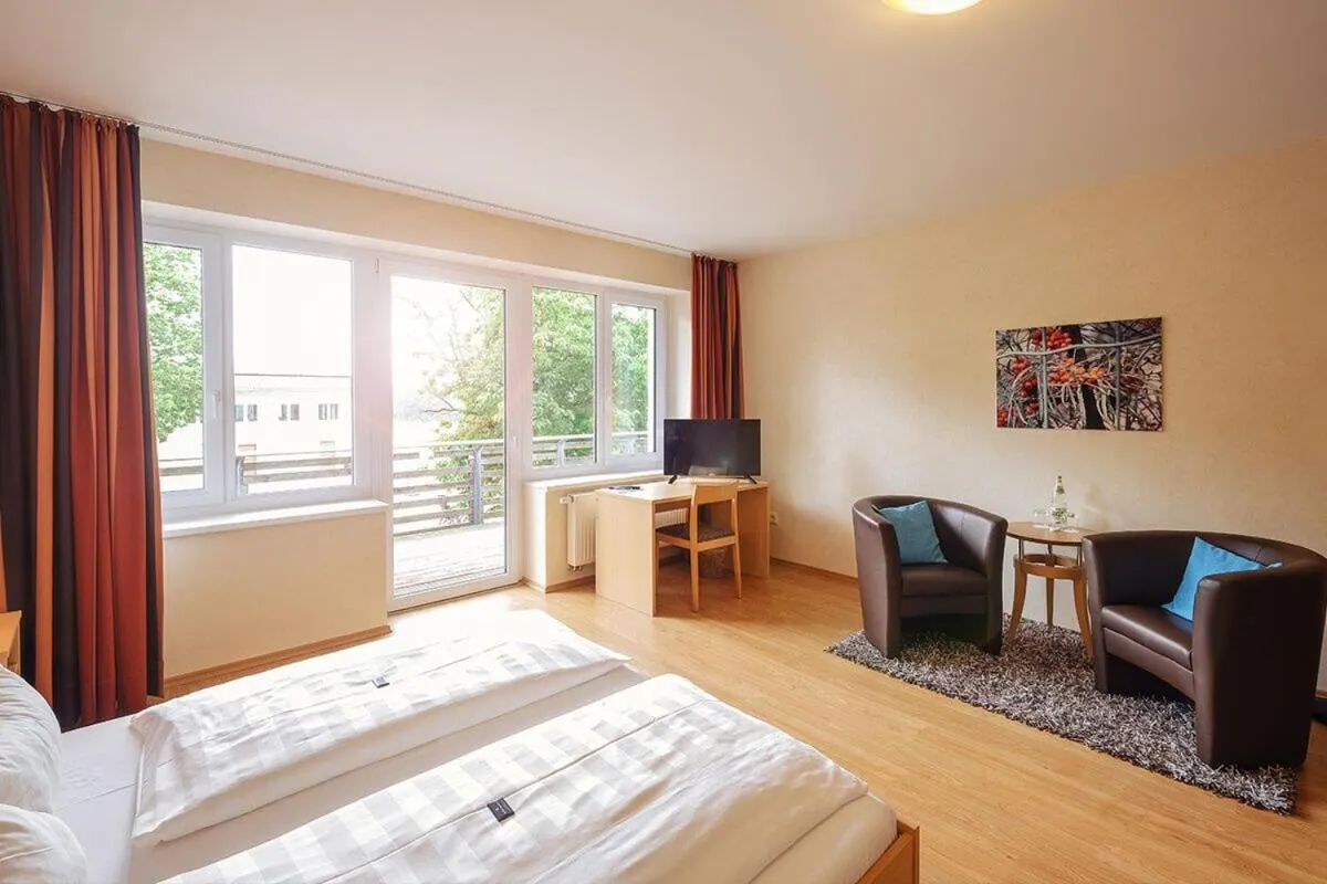 Bedroom, Bed in Bernsteinsee Hotel&Ferien