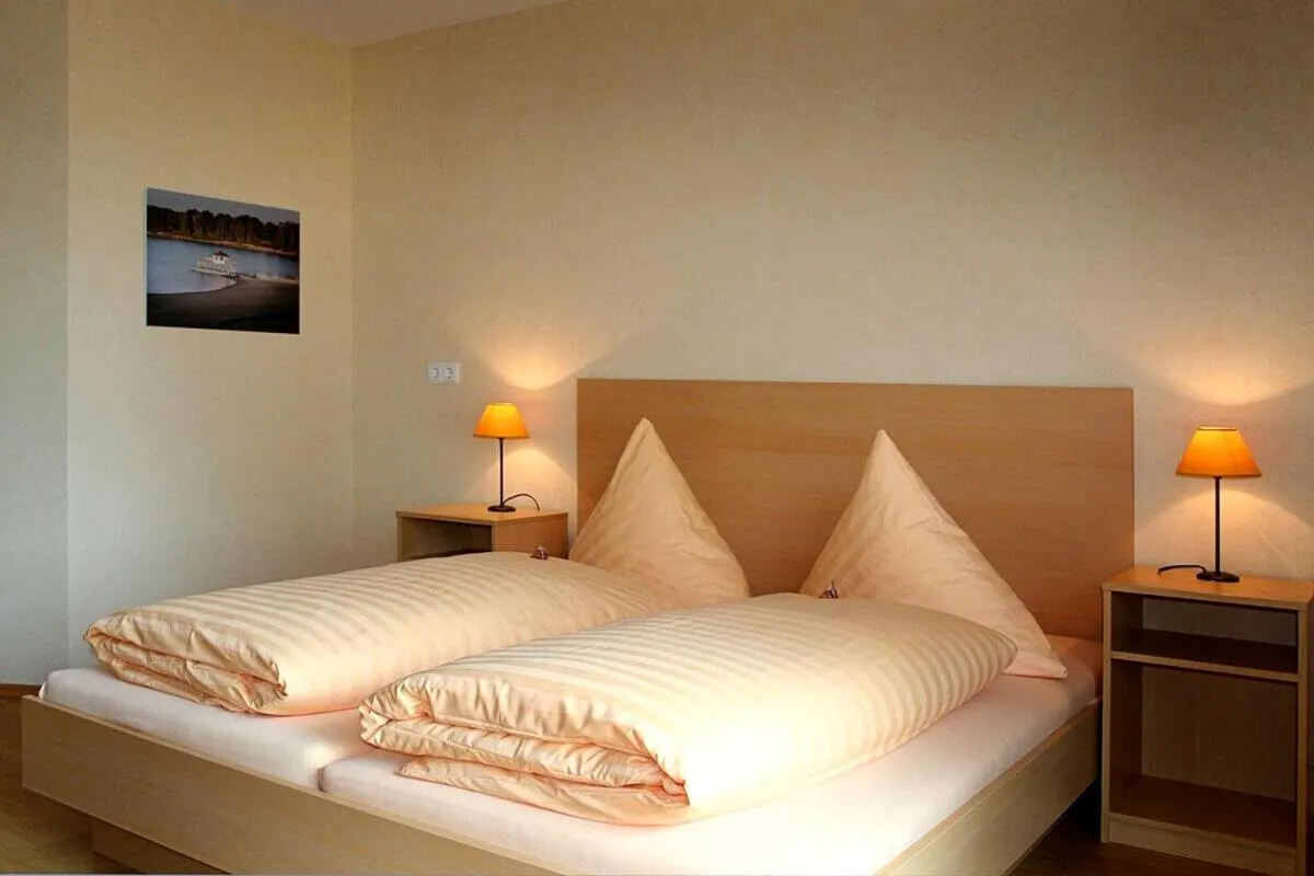 Bedroom, Bed in Bernsteinsee Hotel&Ferien