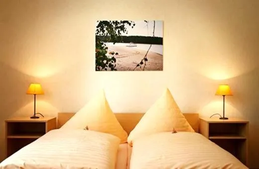 Bedroom, Bed in Bernsteinsee Hotel&Ferien