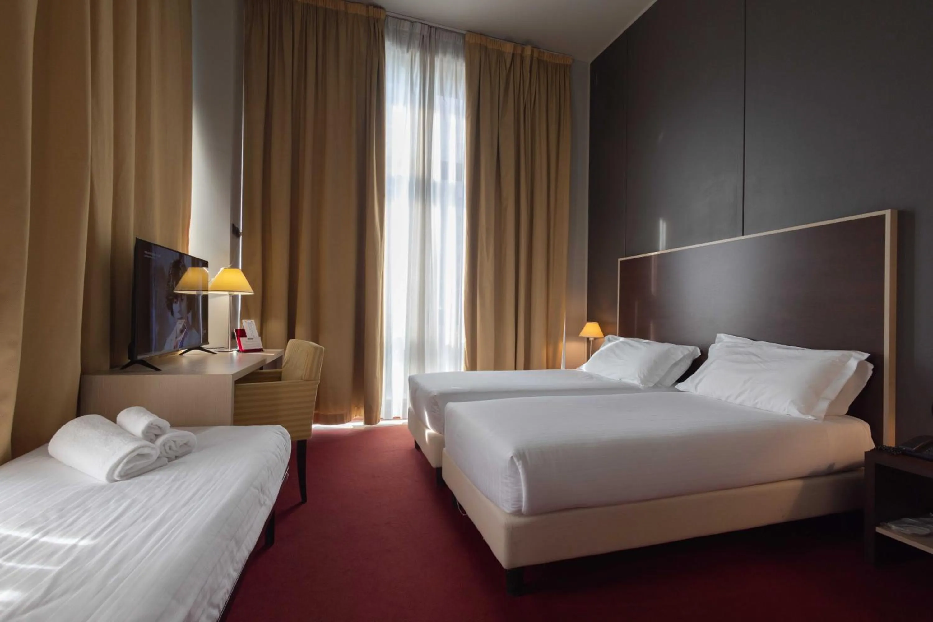 Bed in Art Hotel Olympic