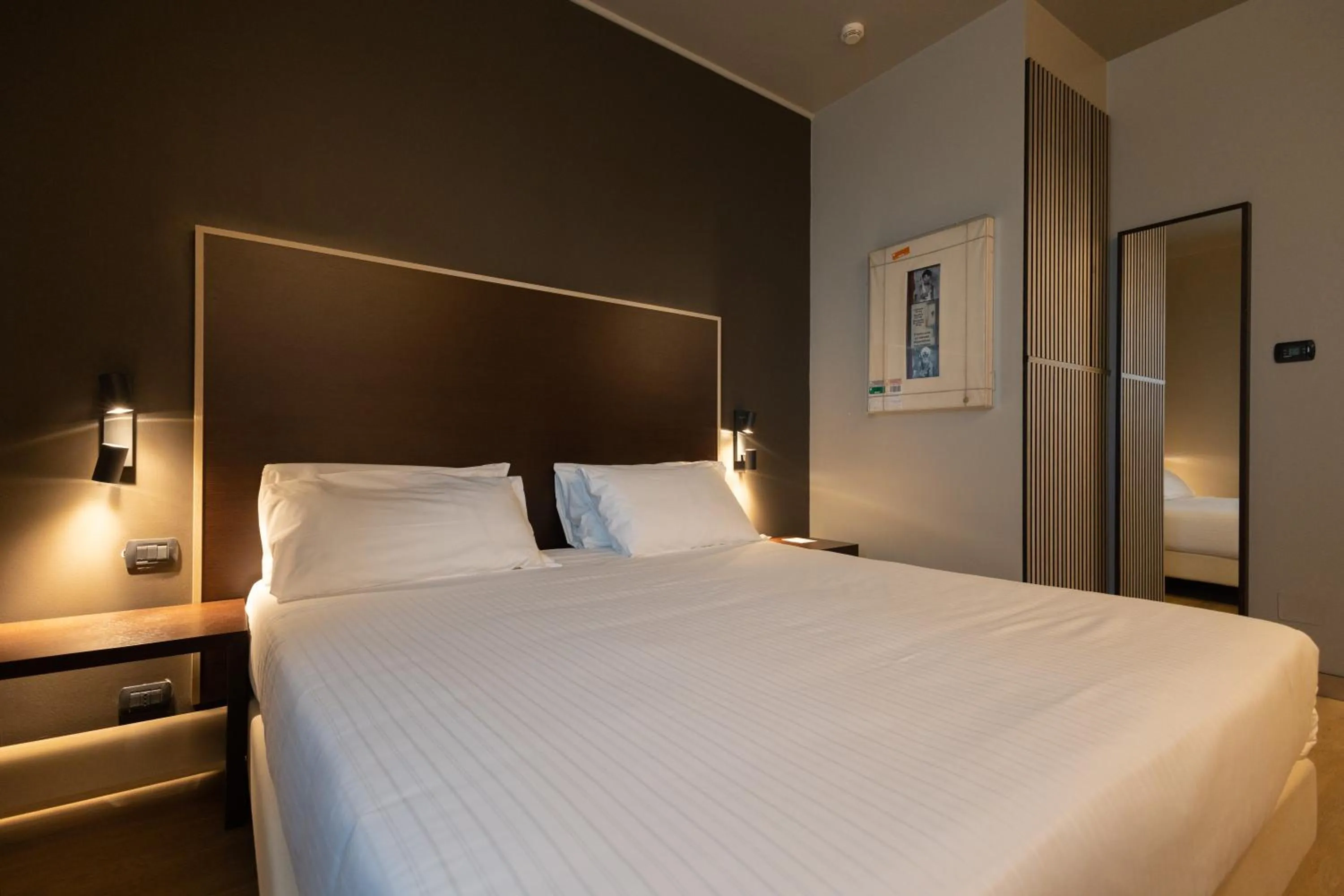 Bed in Art Hotel Olympic