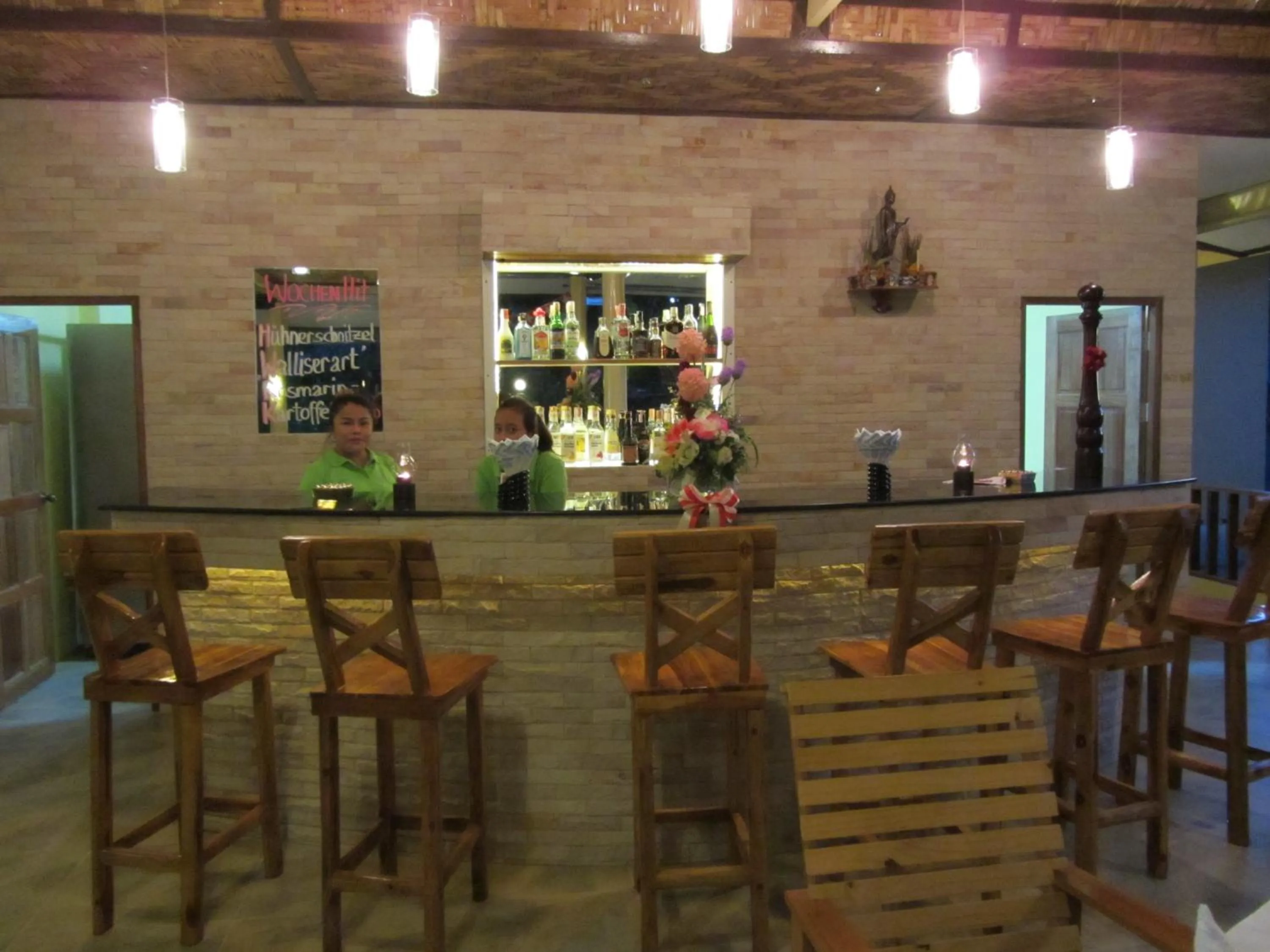 Lounge or bar in Flower Paradise Bungalows & Swiss Restaurant Roestiland