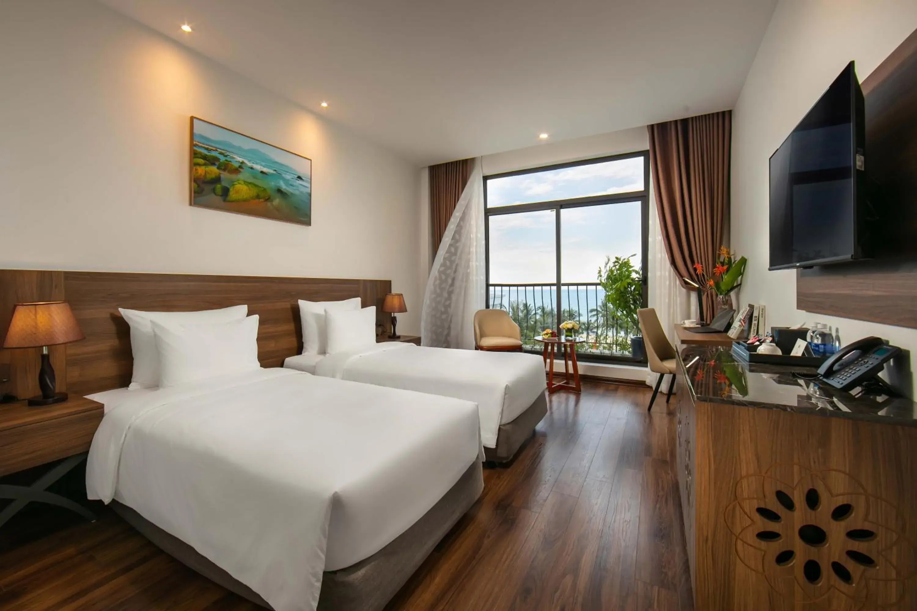 Deluxe Twin Room with Sea View in Nesta Hotel Da Nang Deluxe Twin Room with Sea View in Nesta Hotel Da Nang