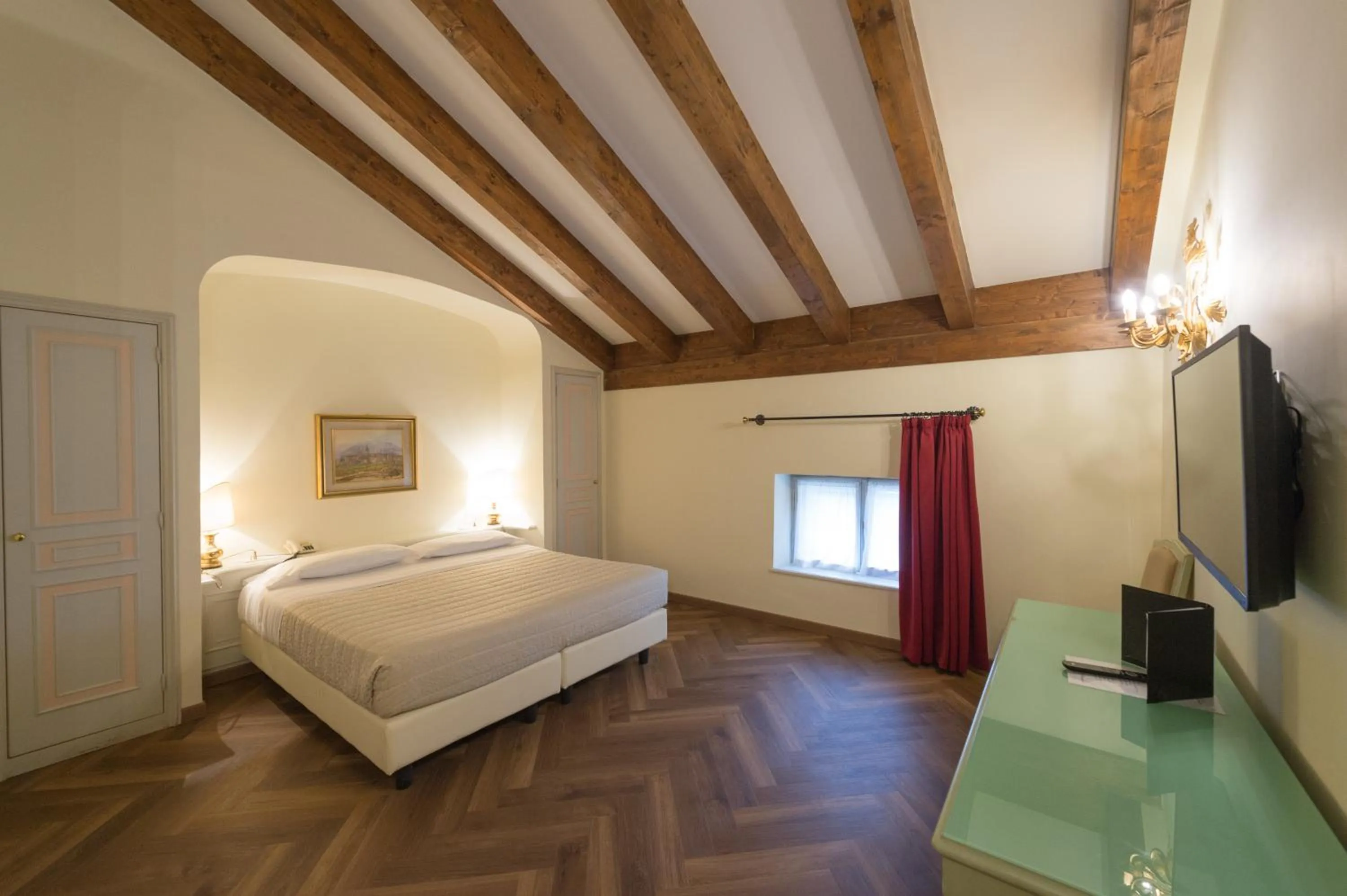 Bed in Grand Hotel Liberty