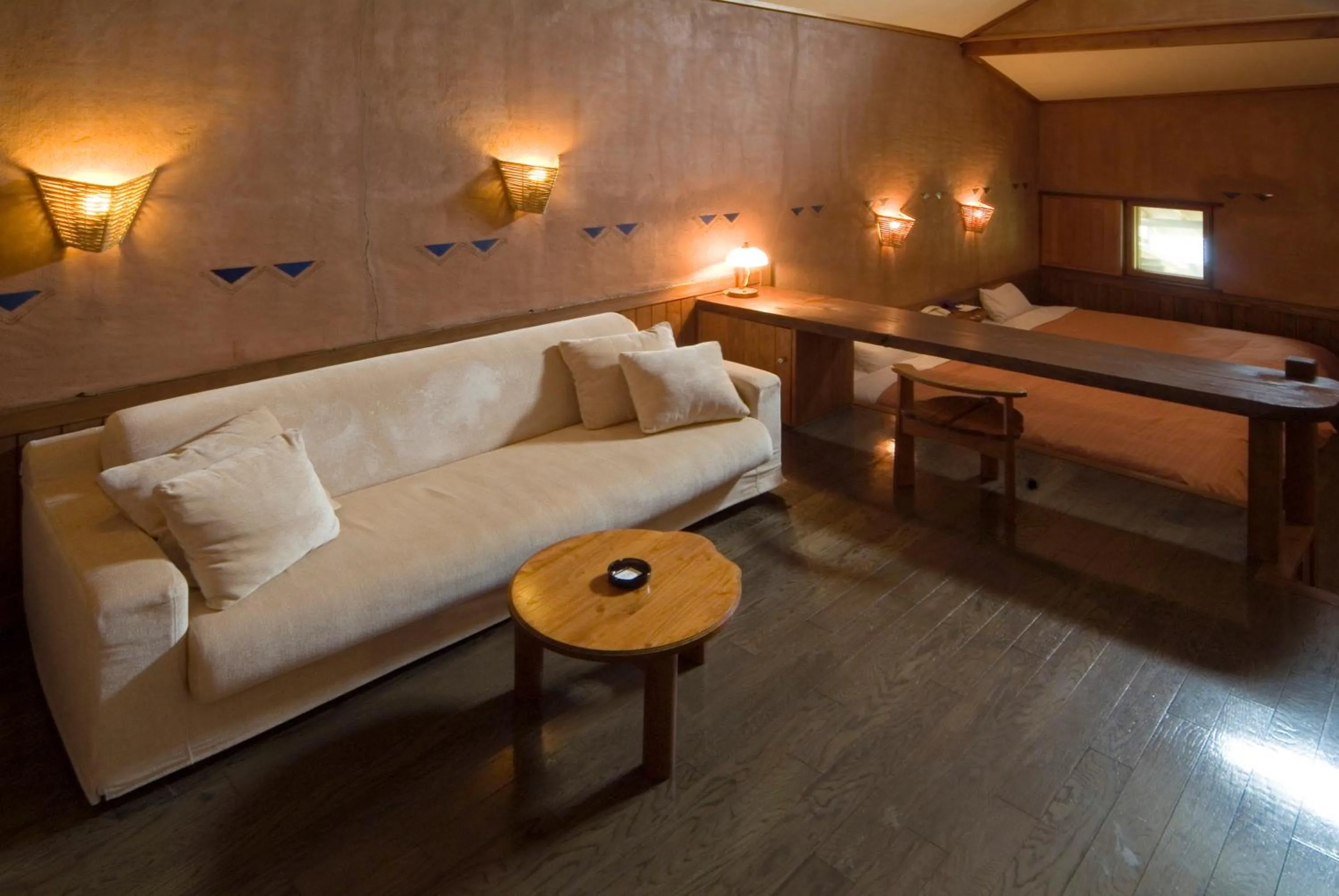 Seating area, Bed in Resonate Club Kuju