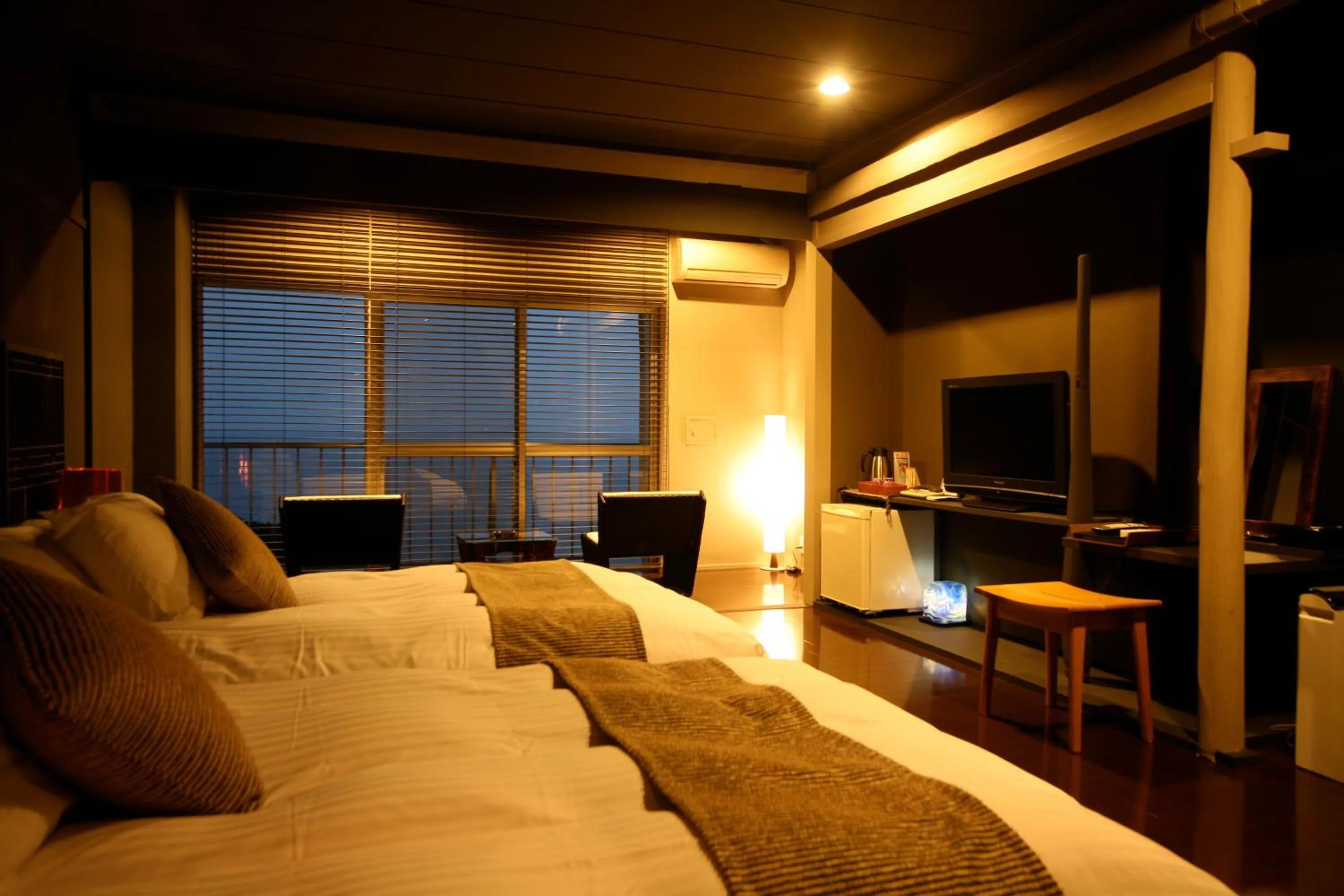 Photo of the whole room, Bed in Tabinoyado Ushionoakari Geiboso