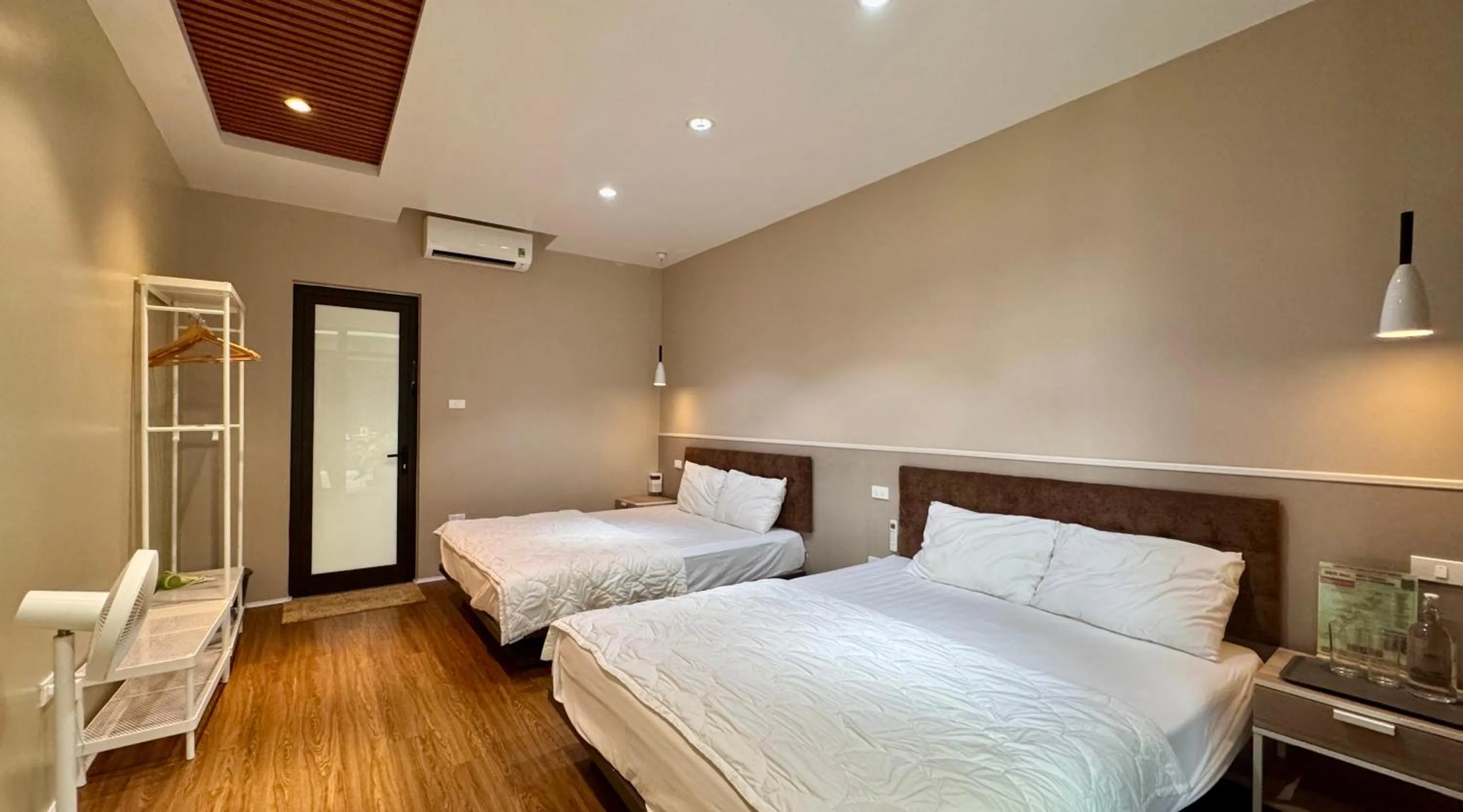 Bed in PHOENIX MINH CHÂU HOTEL