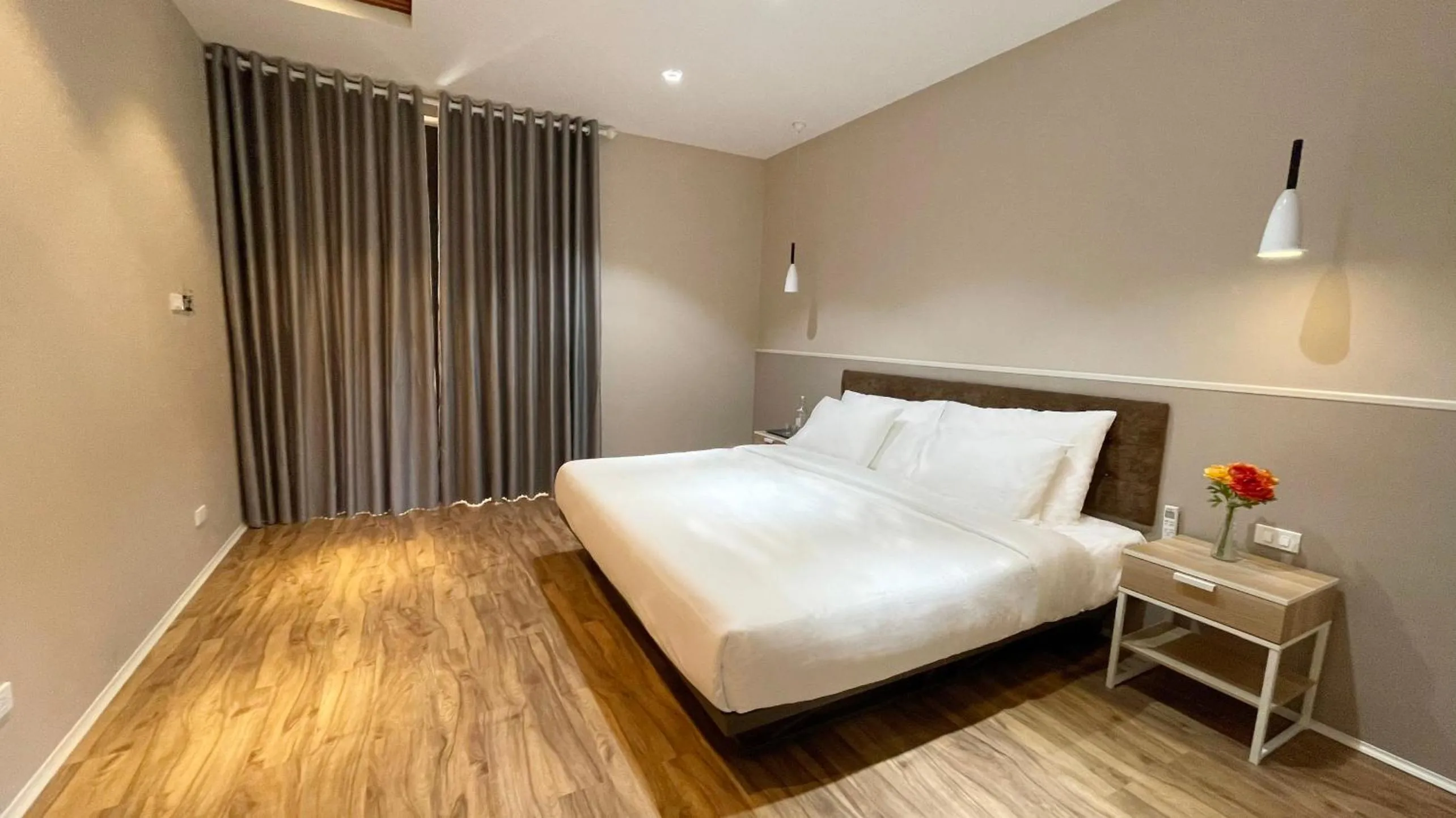 Bed in PHOENIX MINH CHÂU HOTEL