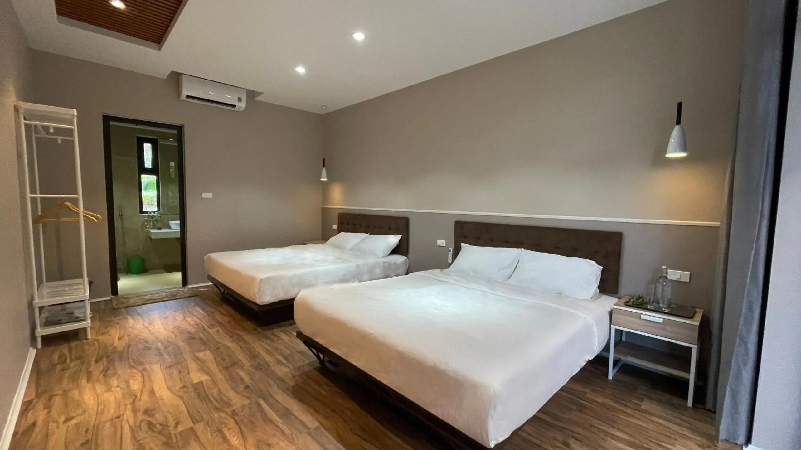 Bed in PHOENIX MINH CHÂU HOTEL