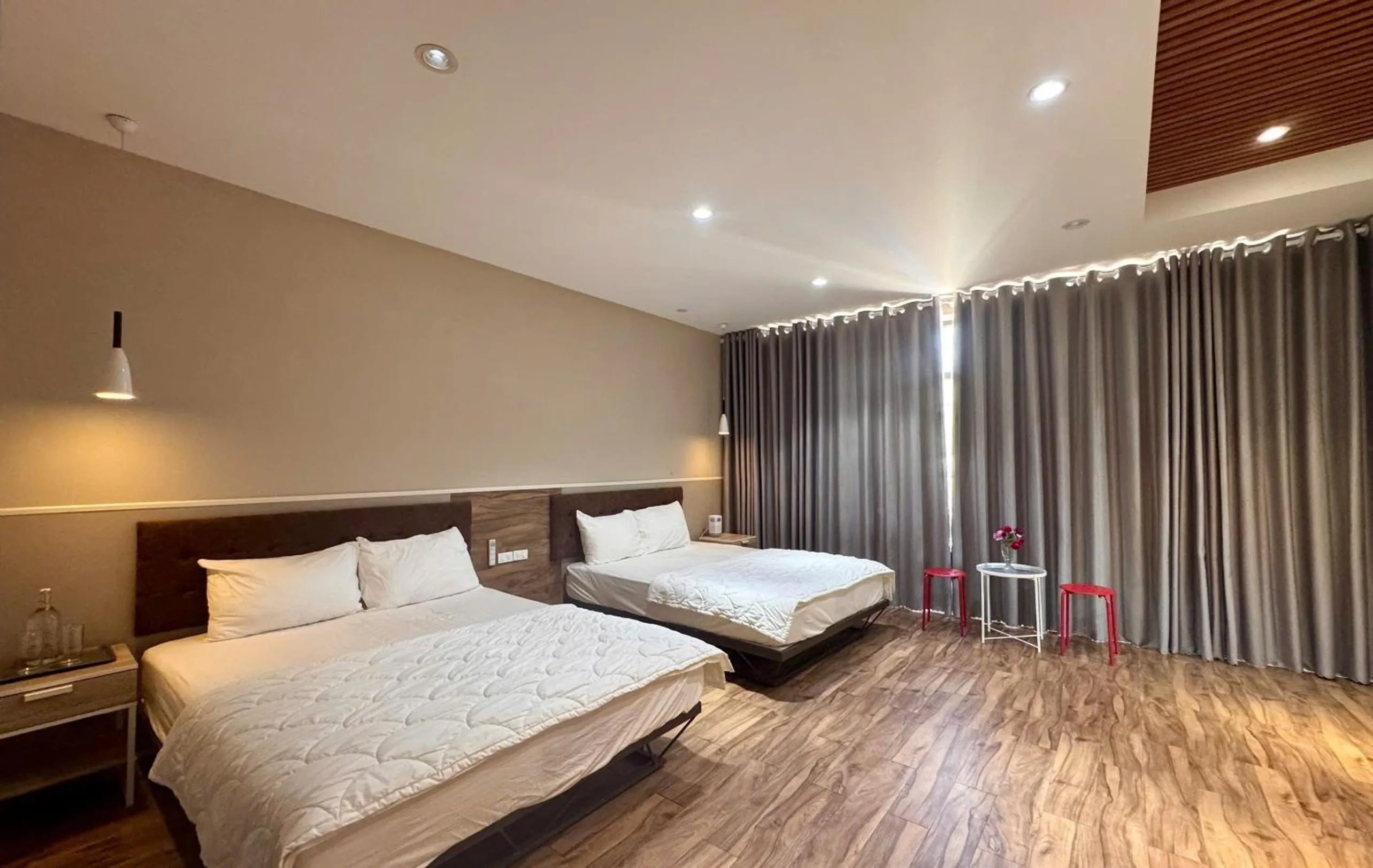 Bed in PHOENIX MINH CHÂU HOTEL