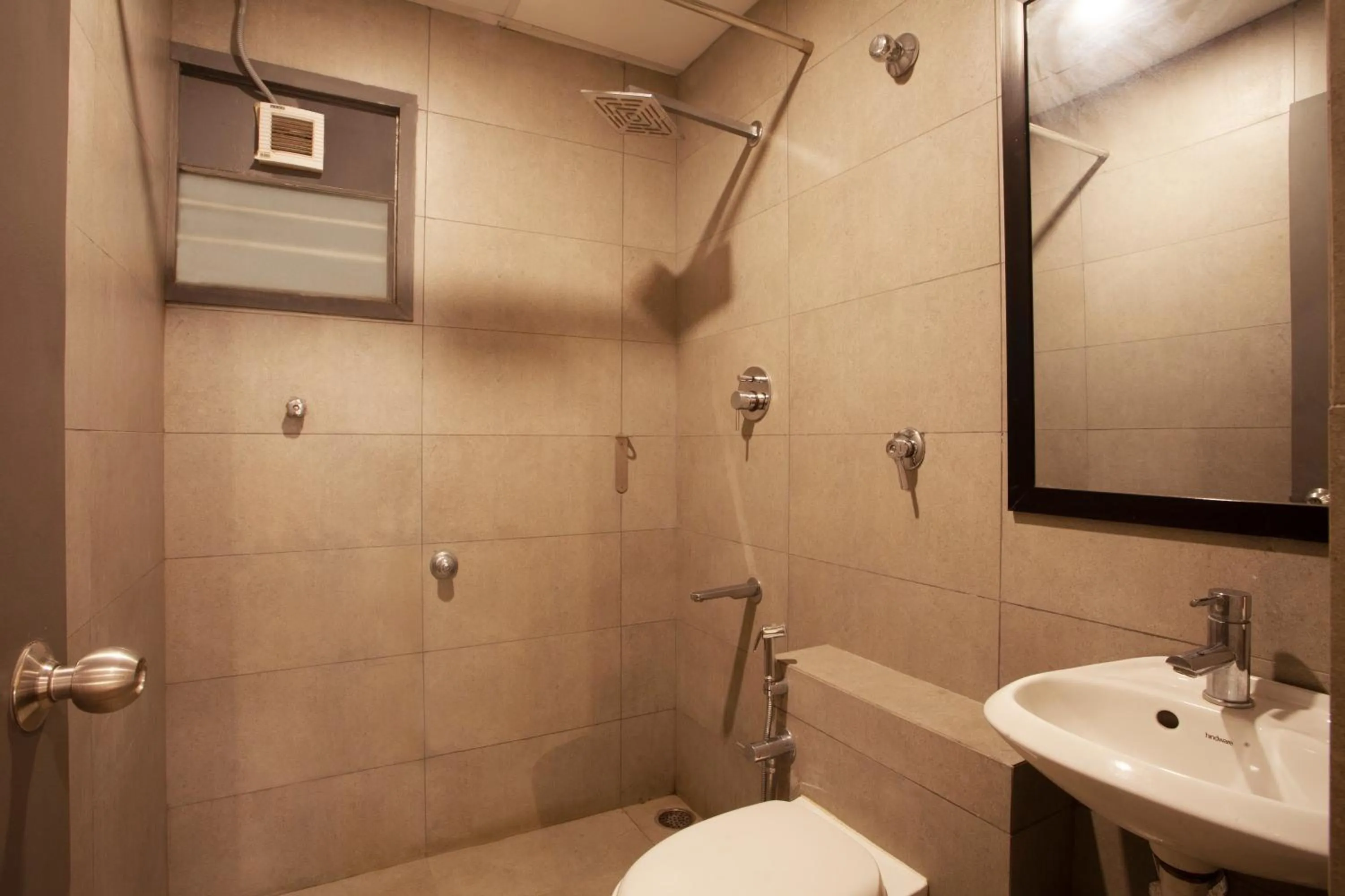 Shower in Hotel Panchvati Comforts