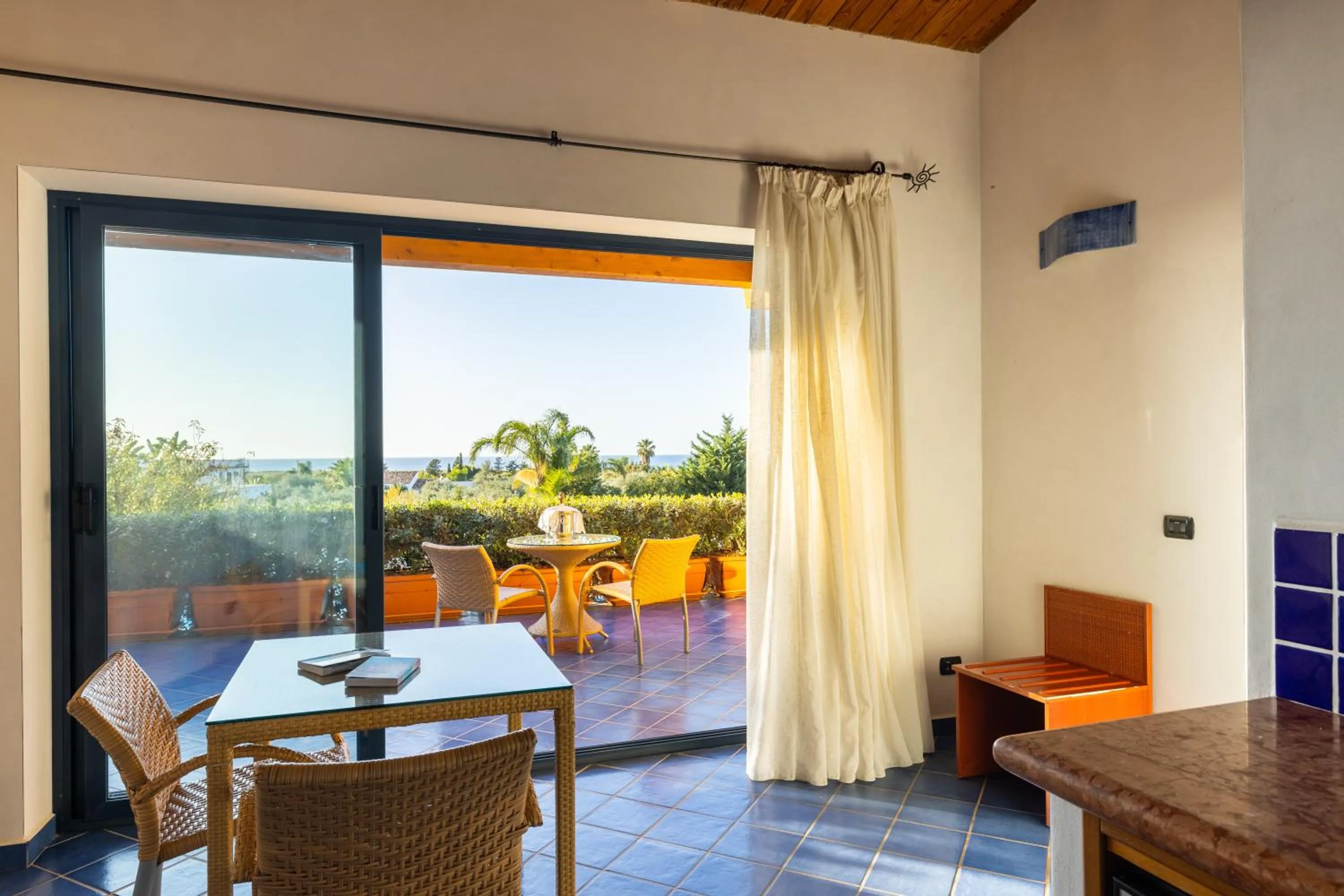 Seating area in Magaggiari Hotel Resort